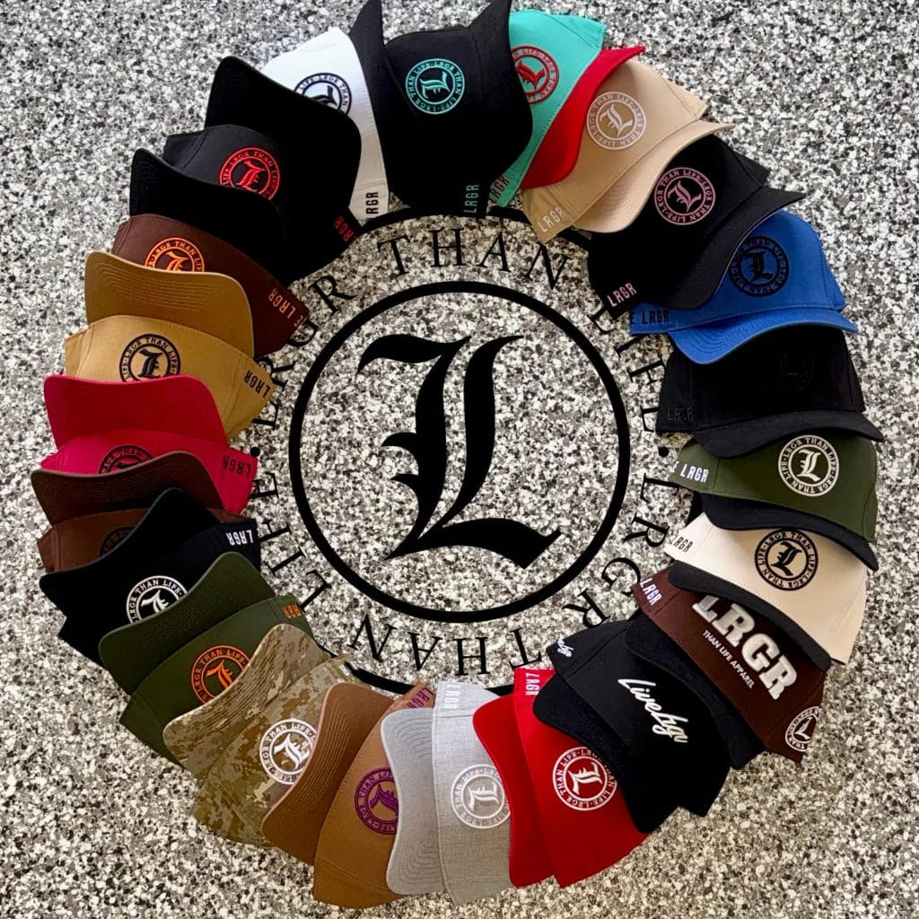 Collection of baseball caps arranged in a circular pattern with a brand logo in the center.