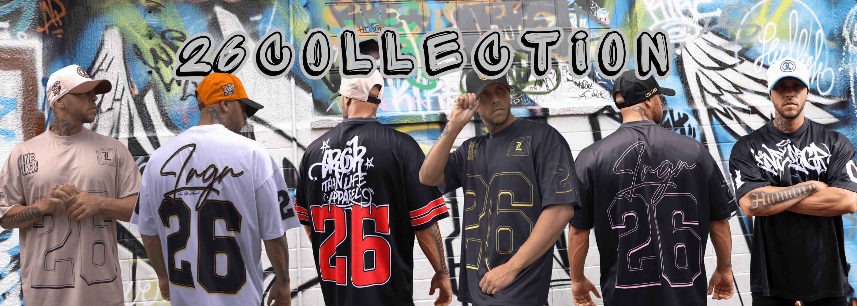 Collection of sports jerseys with number 26 against a graffiti-covered wall.