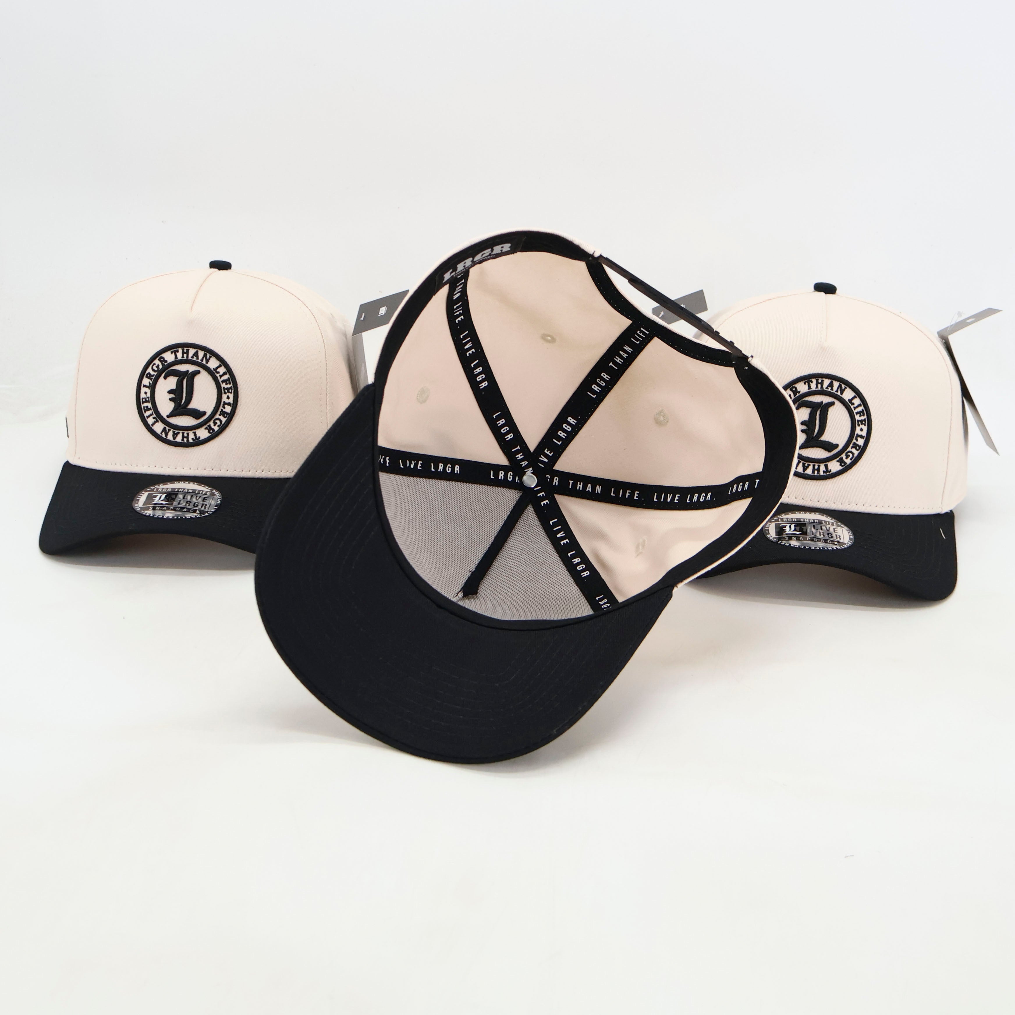 Three baseball caps with a logo on a white background
