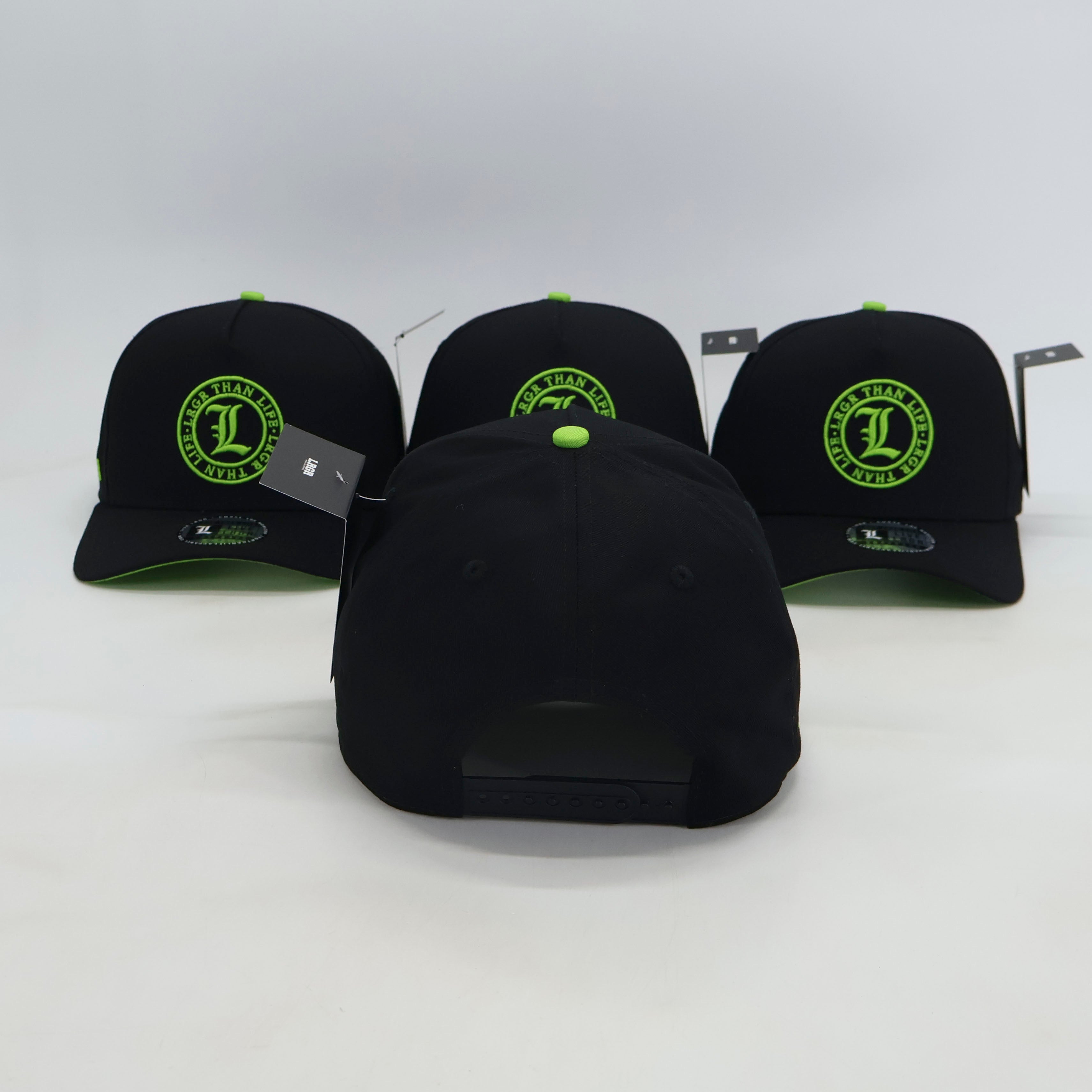 Black baseball caps with green logos on a white background