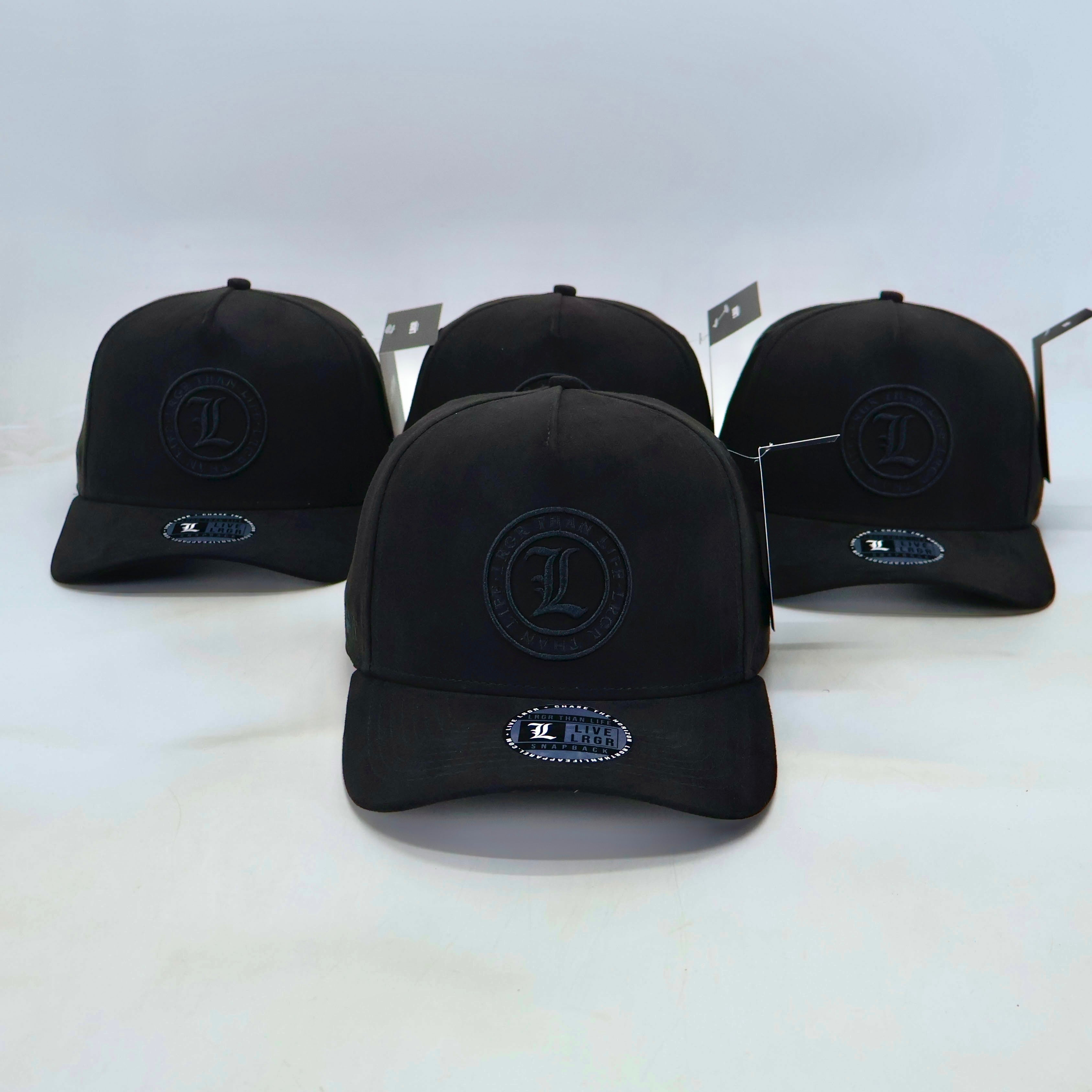 Four black baseball caps with a logo on a white background