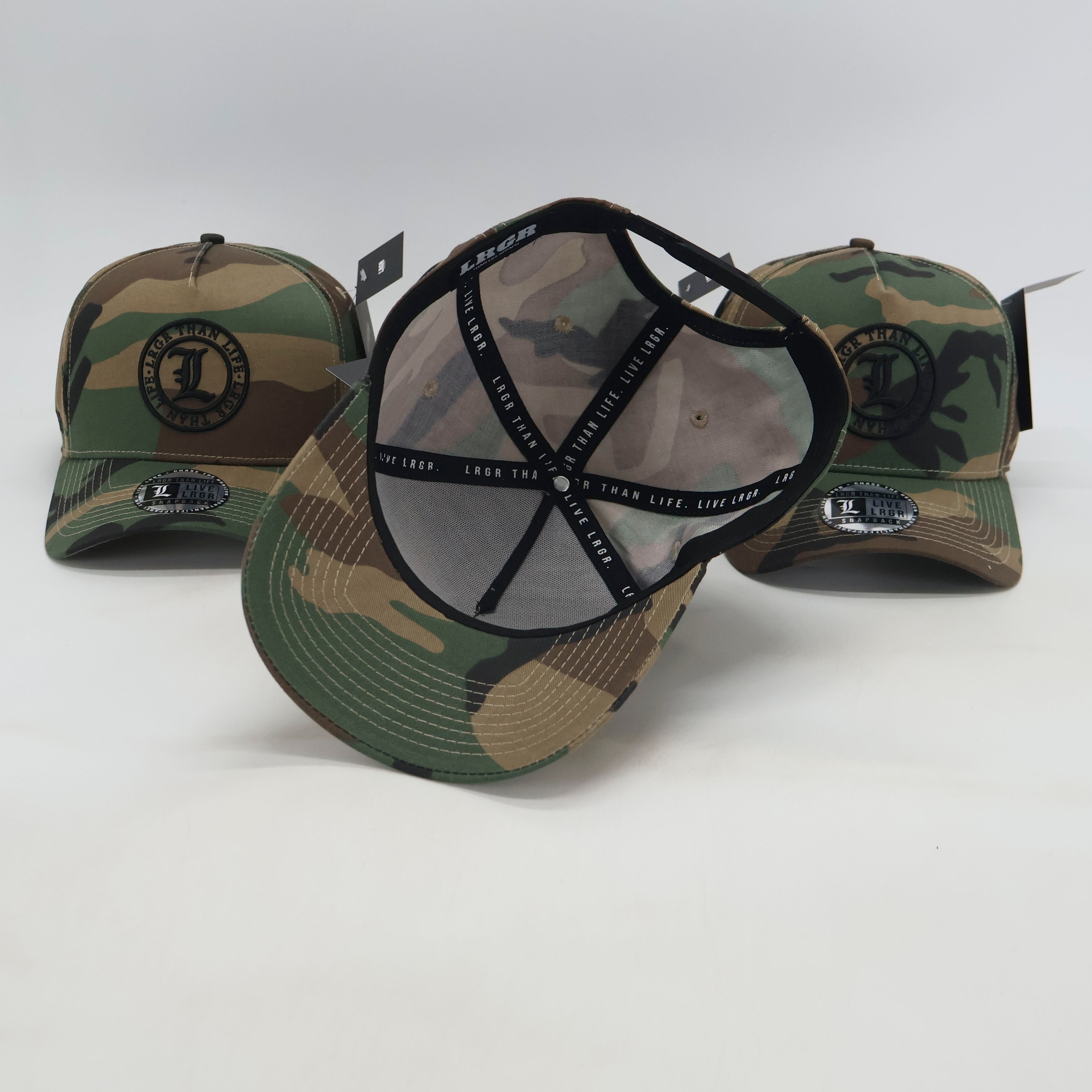 Three camouflage baseball caps with mesh backs on a white background