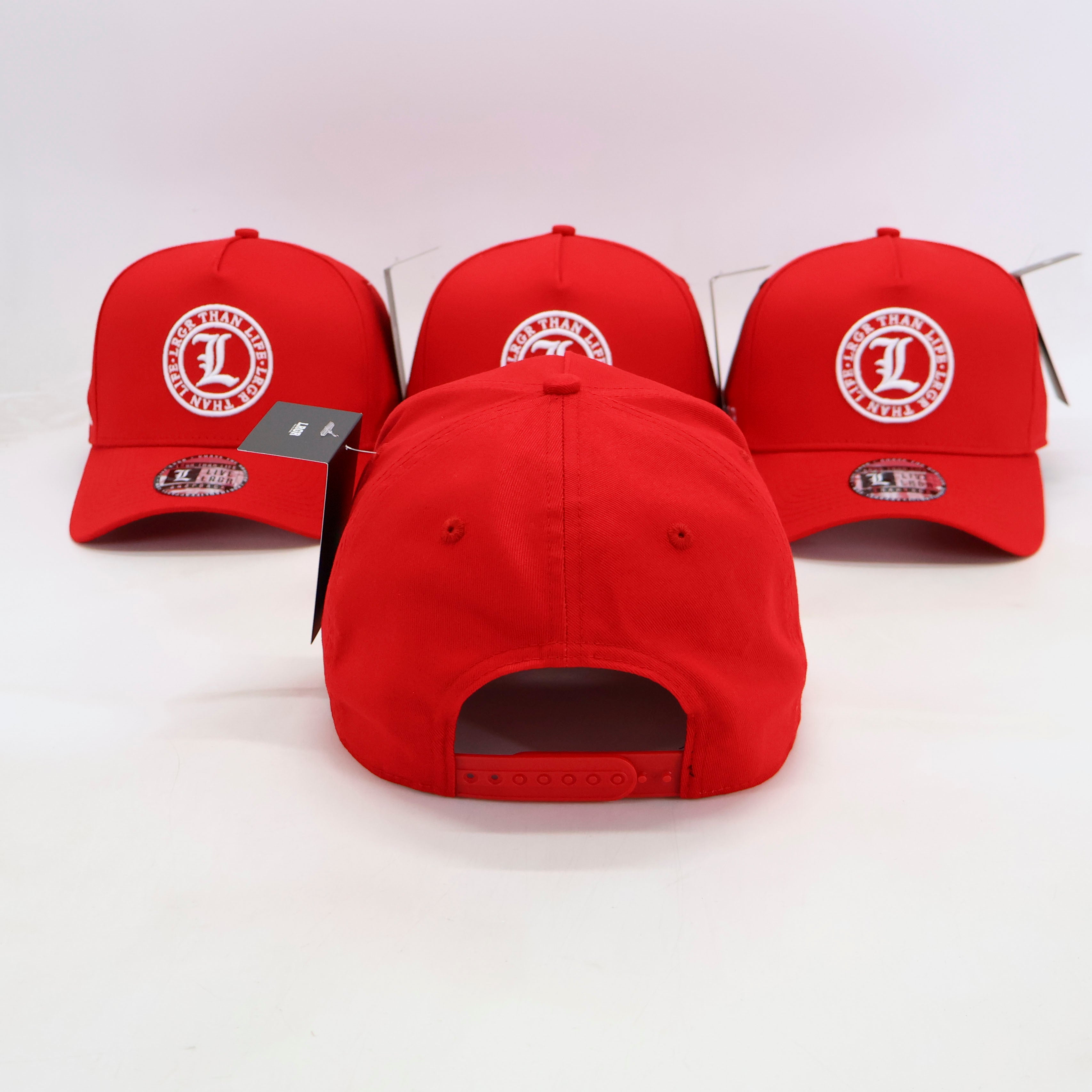 Red baseball caps with a logo on a white background