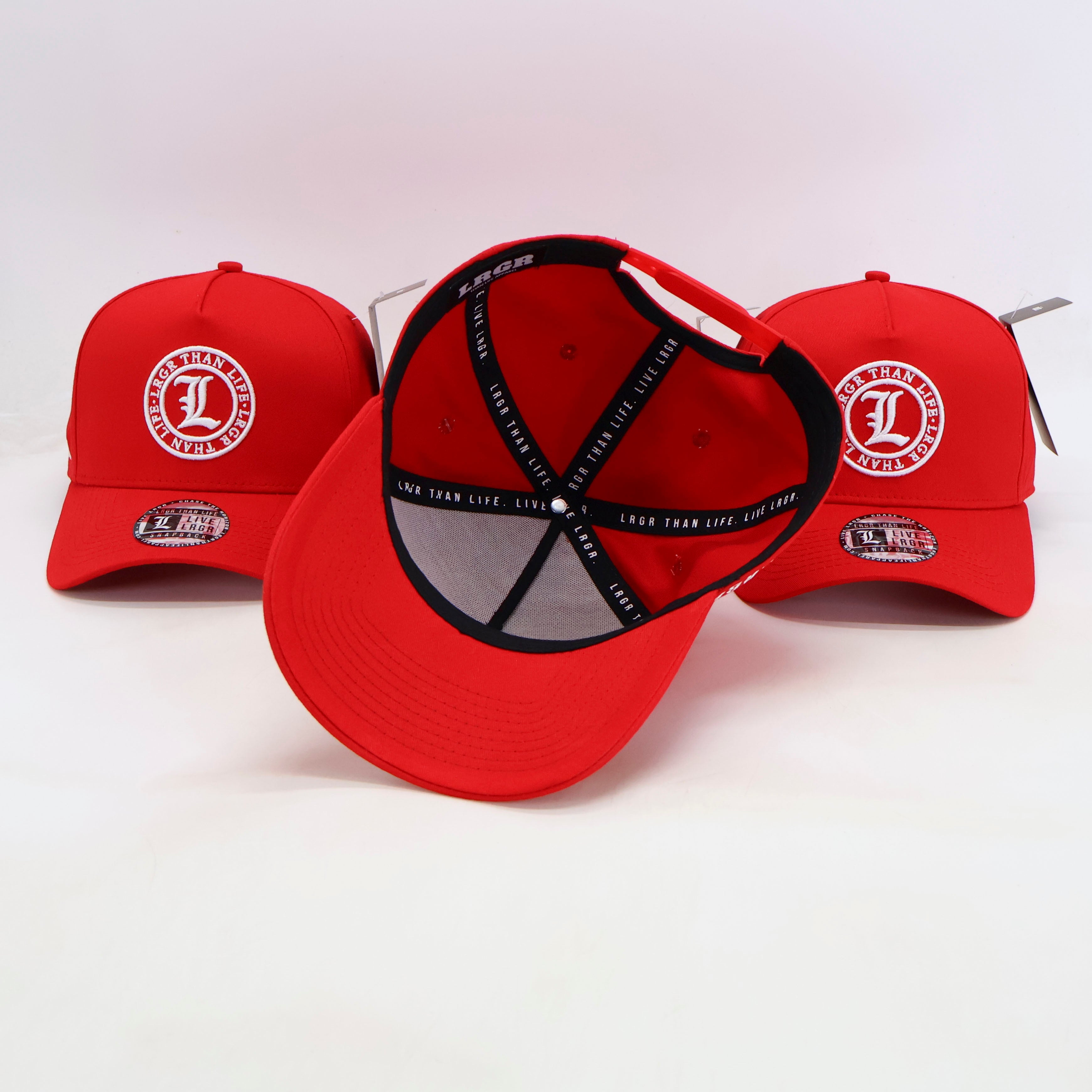 Red baseball caps with a logo on a white background