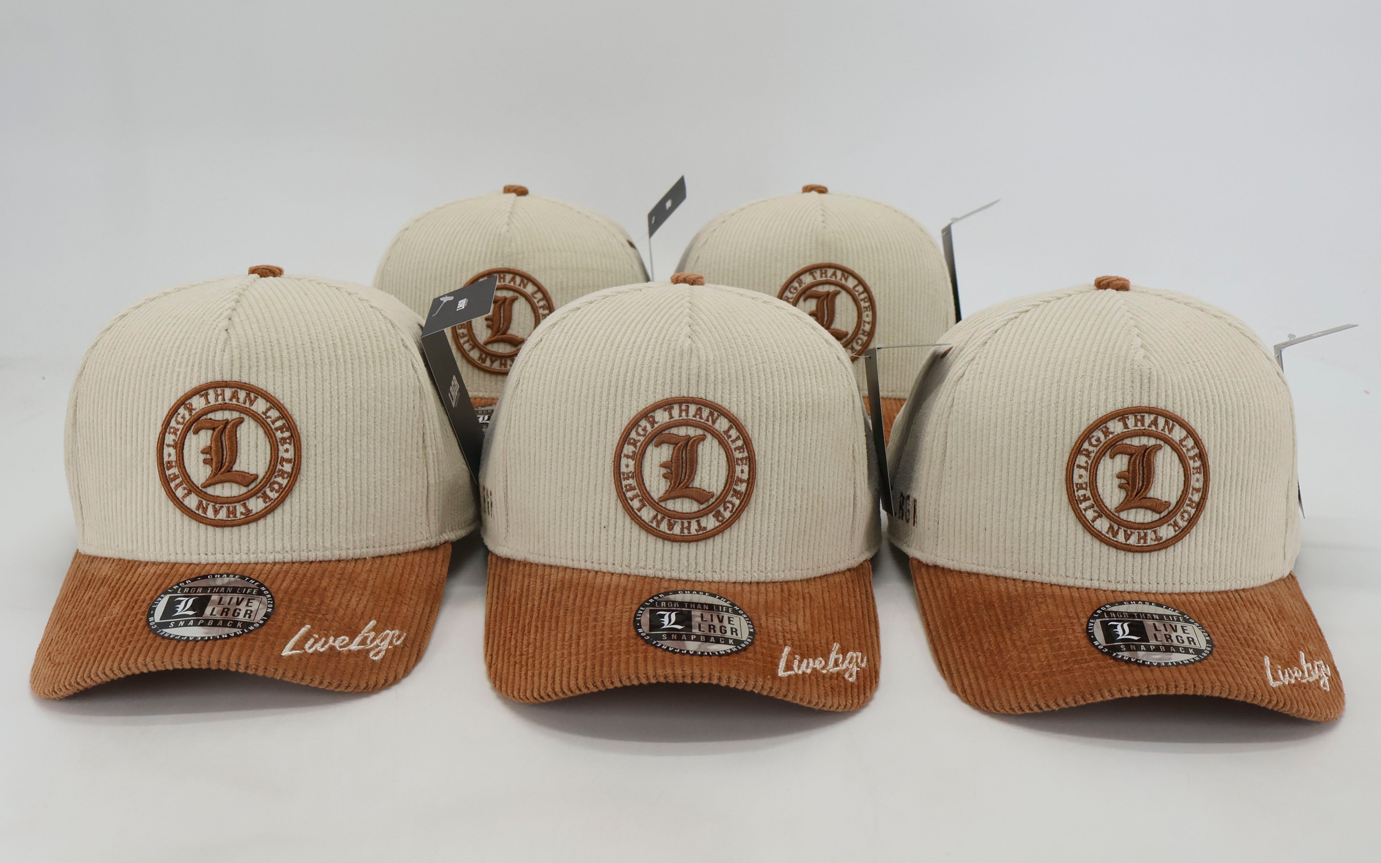 Four beige and brown baseball caps with a logo and text on a white background