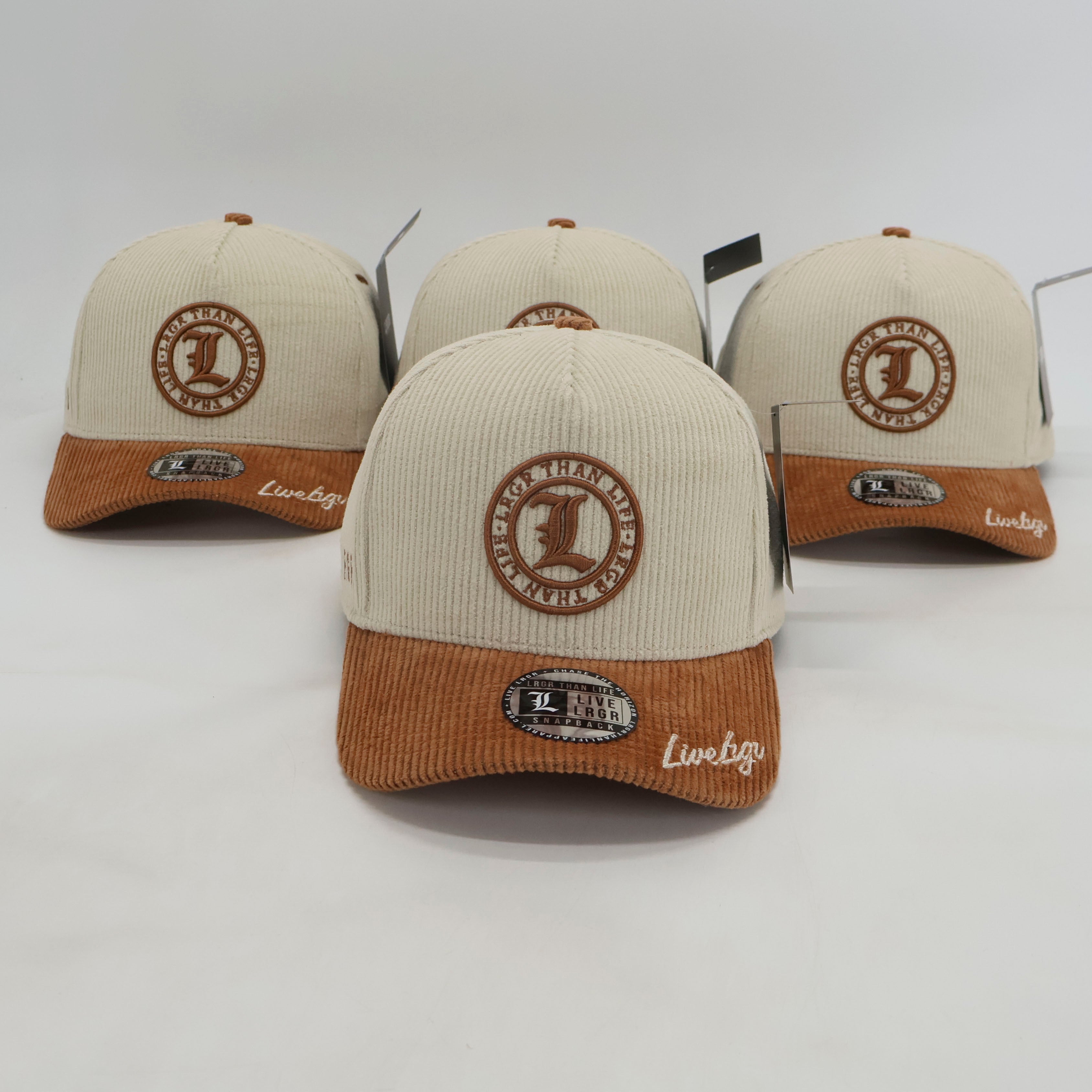 Four beige and brown baseball caps with a logo on a white background
