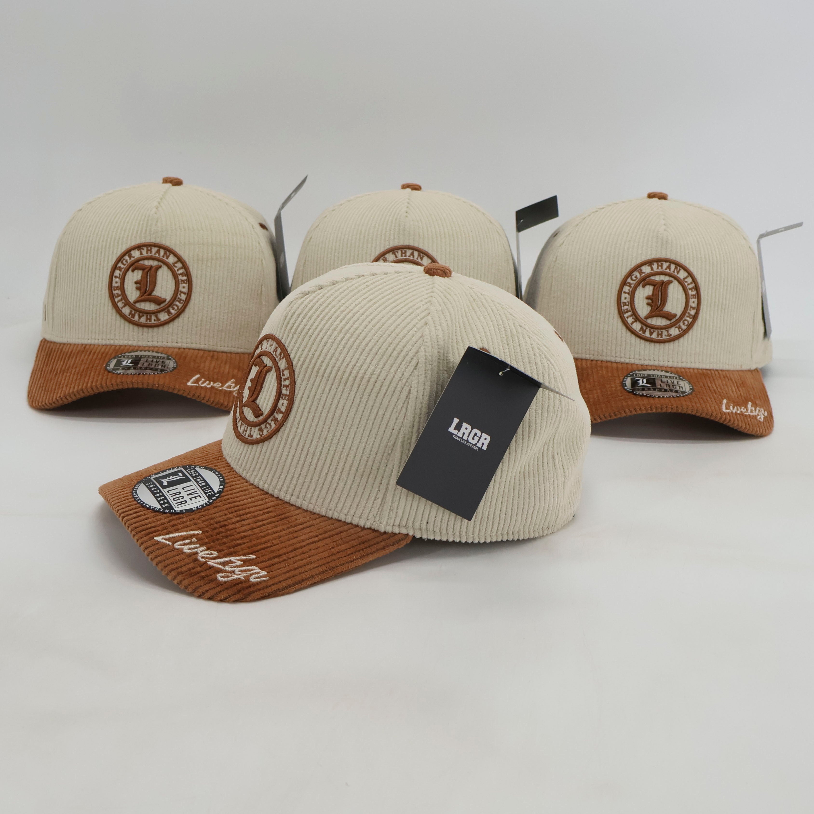 Three beige and brown caps with a visible brand tag on a white background
