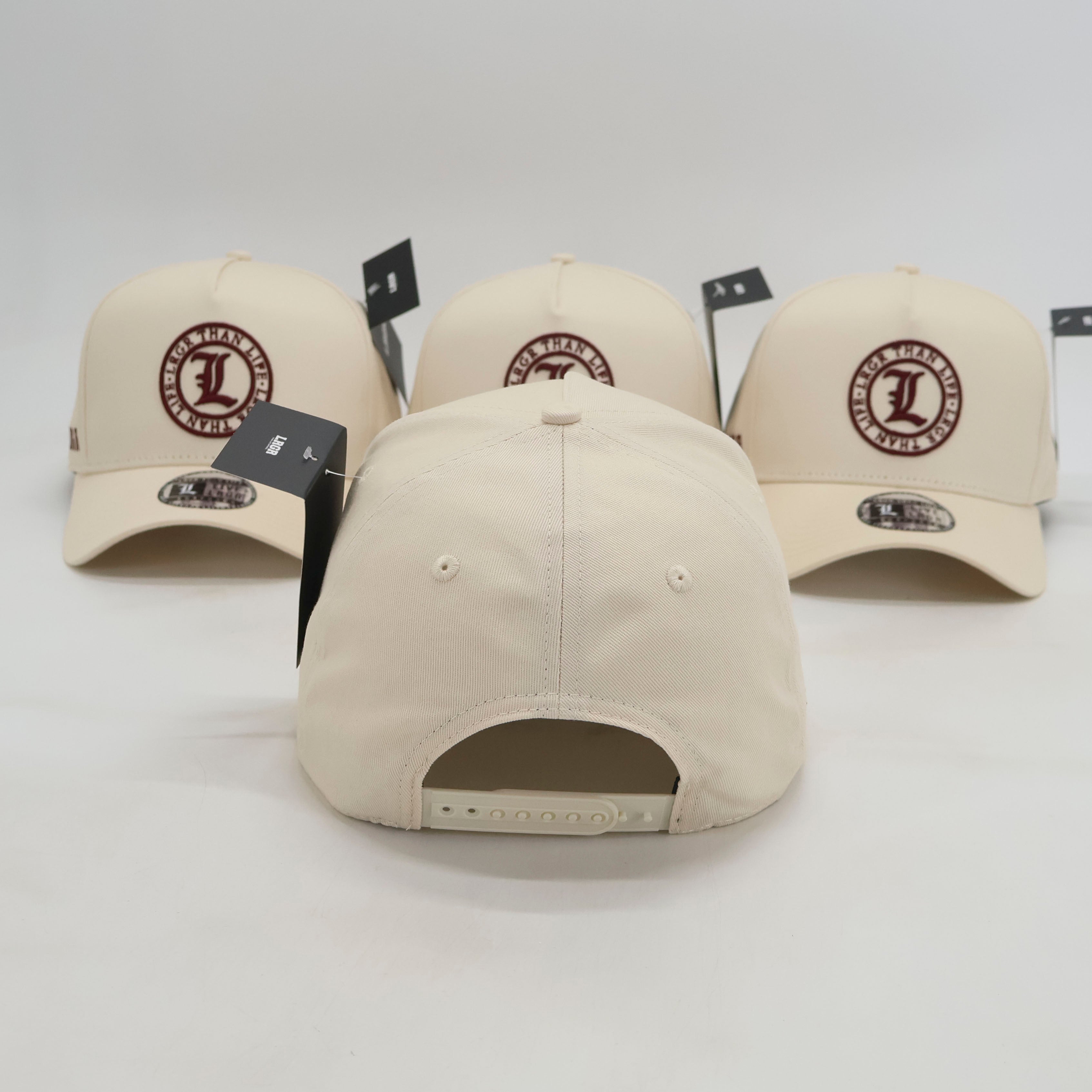 Beige baseball caps with a logo on a white background