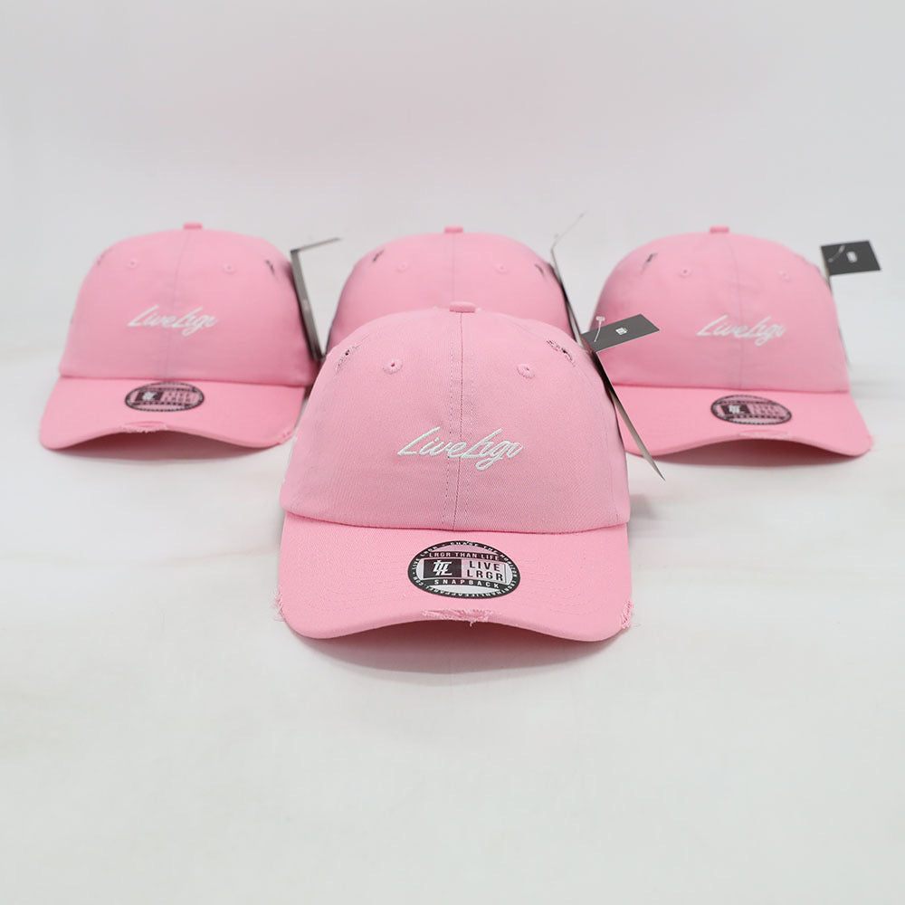 Three pink dad hats with the text 'LUVIG' on them placed against a white background.