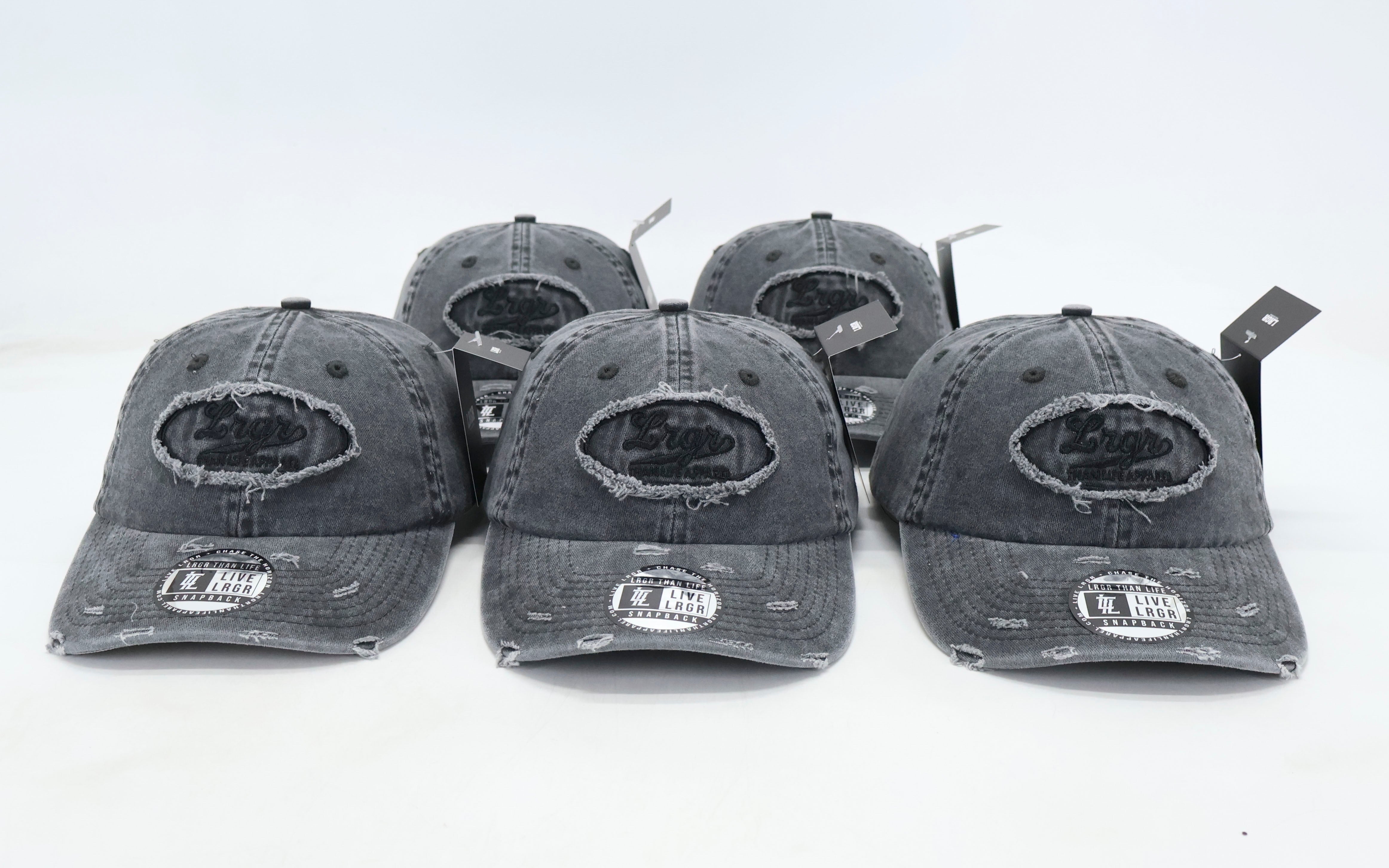 A set of grey dad hats with a 3D embroidery patch on the front displayed against a white background.