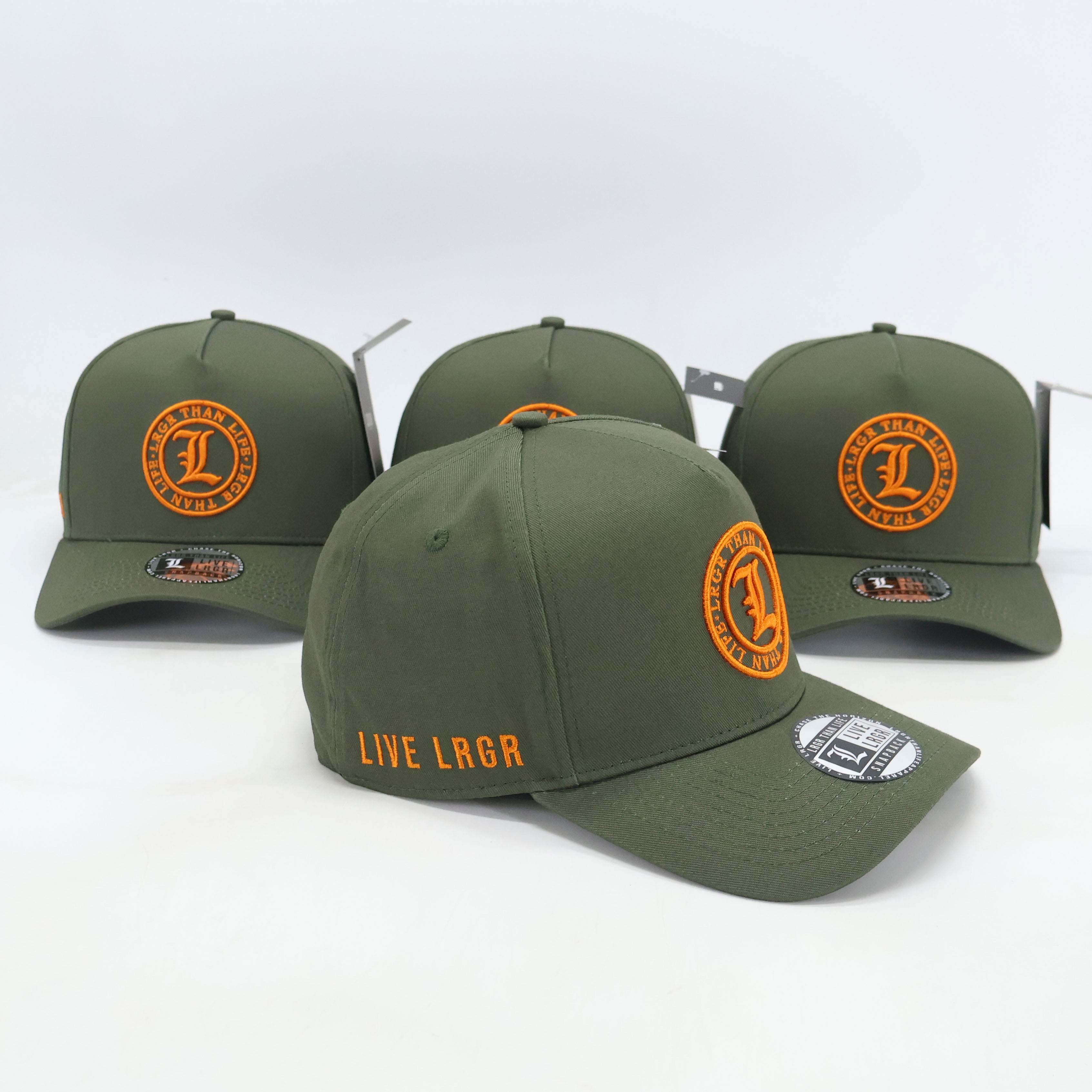 Three green caps with orange branding on a white background