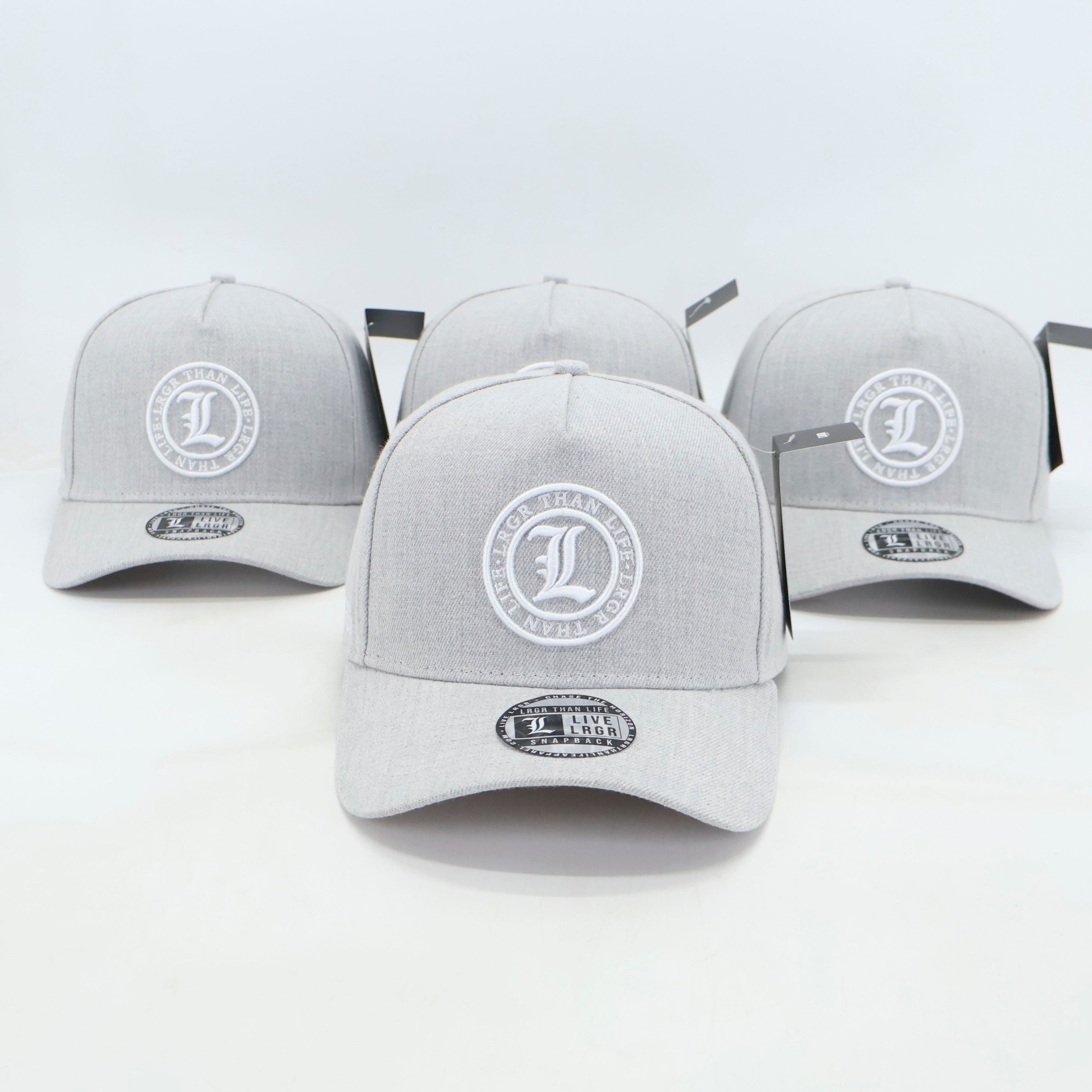 Four gray baseball caps with a logo on a white background