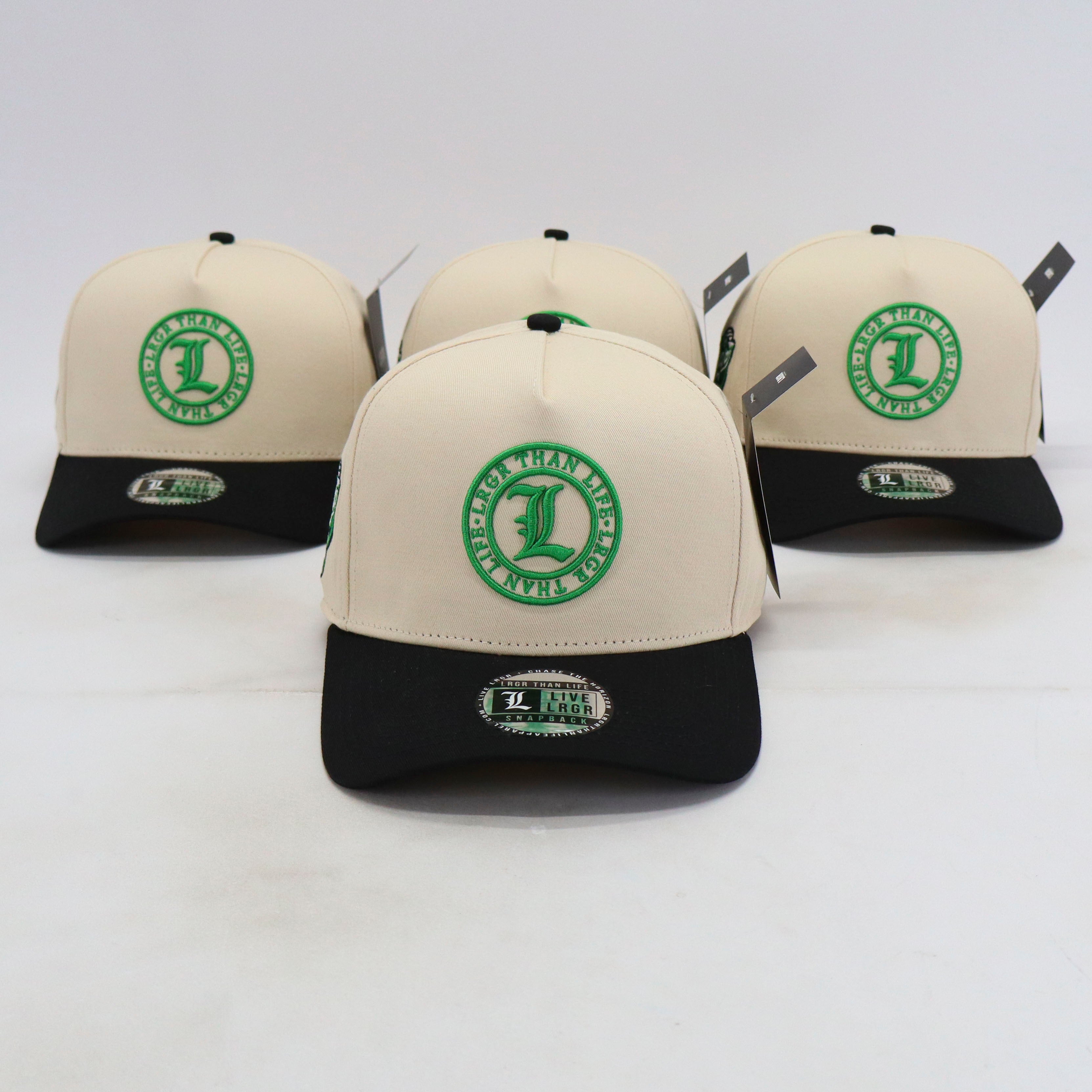 Four baseball caps with green logos on a white background