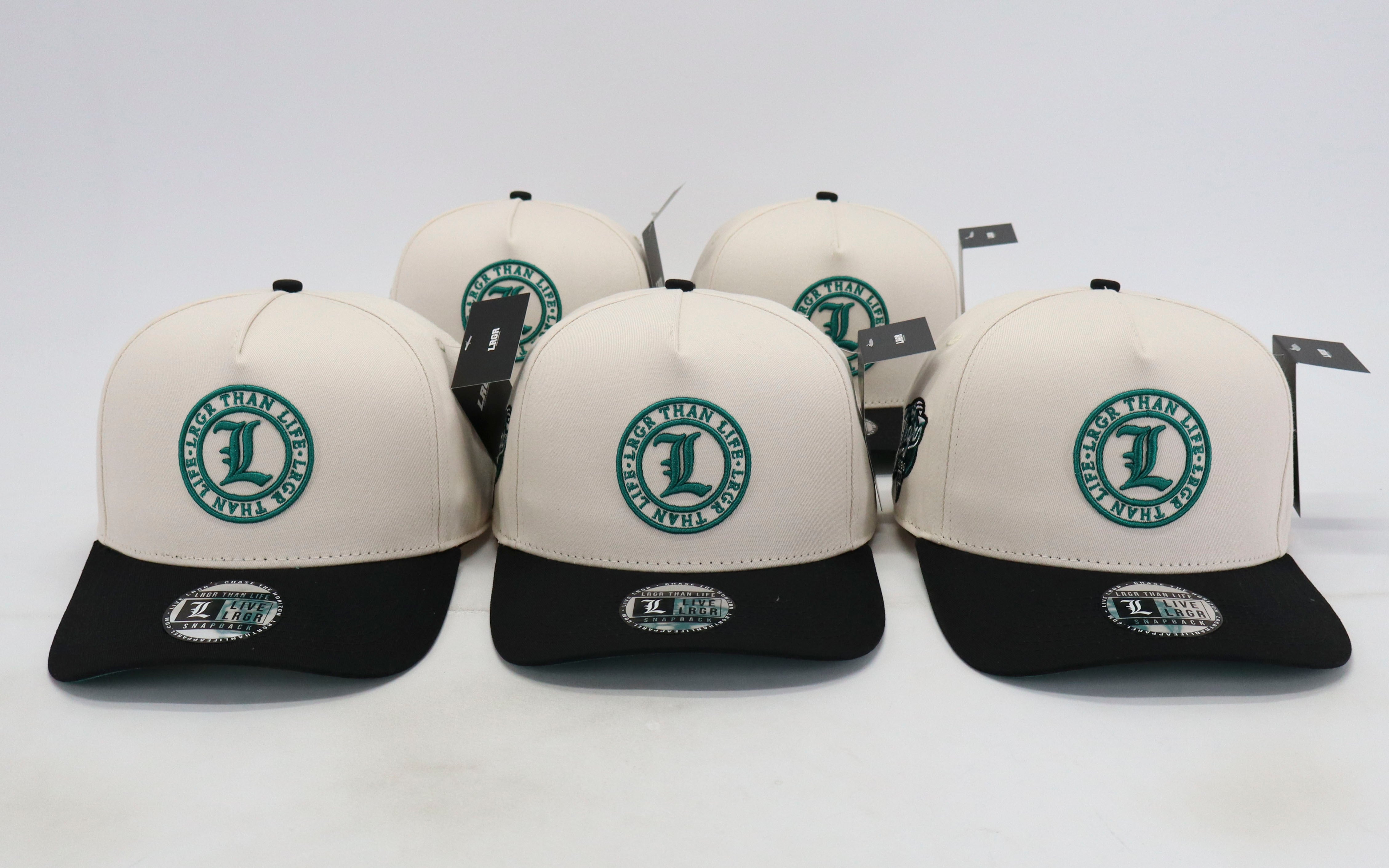 Five white and black caps with a logo on a white background
