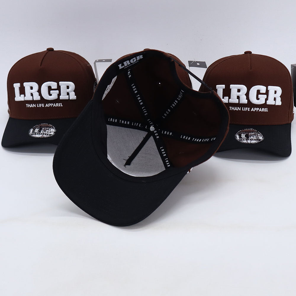 A collection of brown A-frame hats with 'LRGR' and 'THAN LIFE APPAREL' text embroidered on the front.