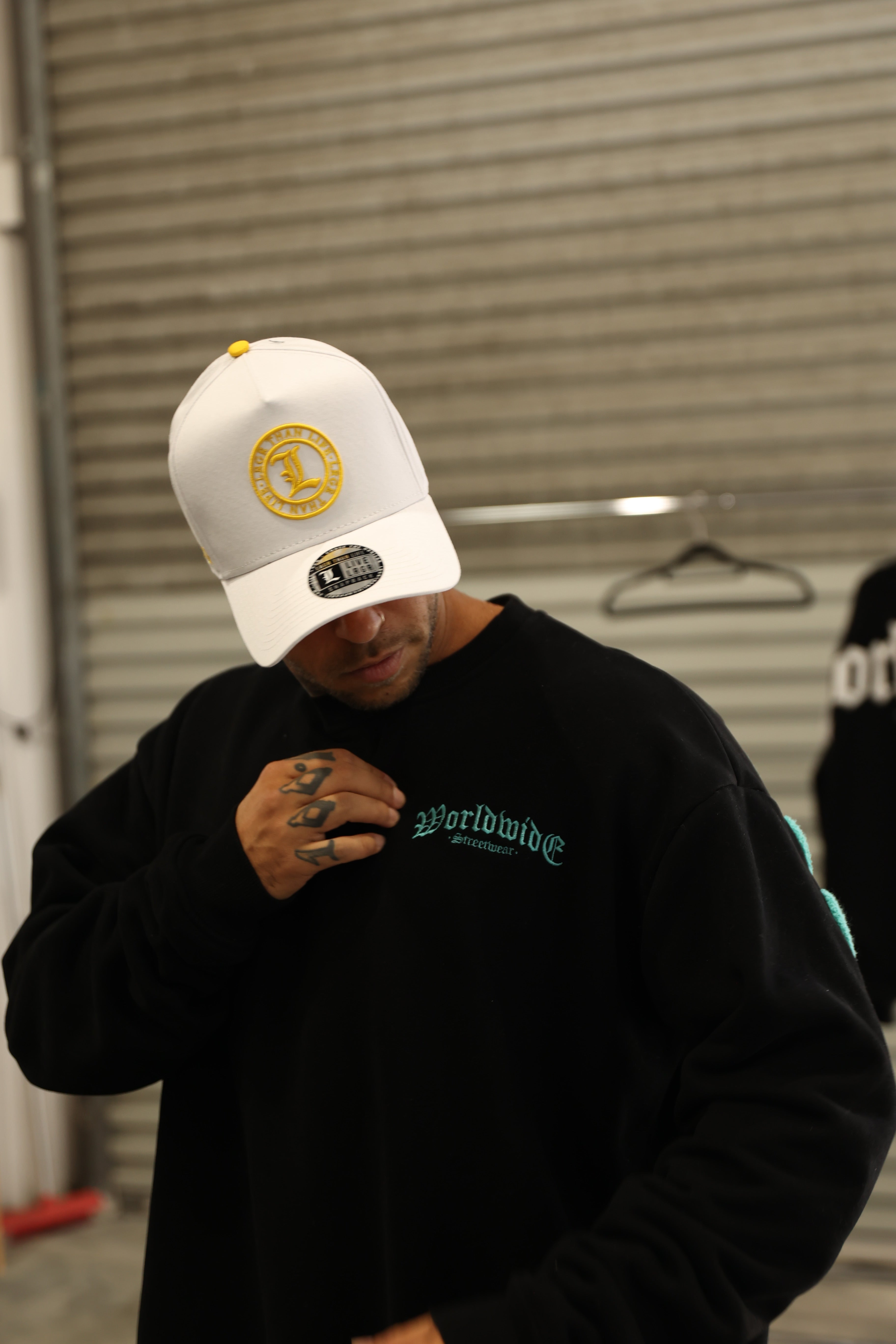 WORLDWIDE - BLACK ON TEAL