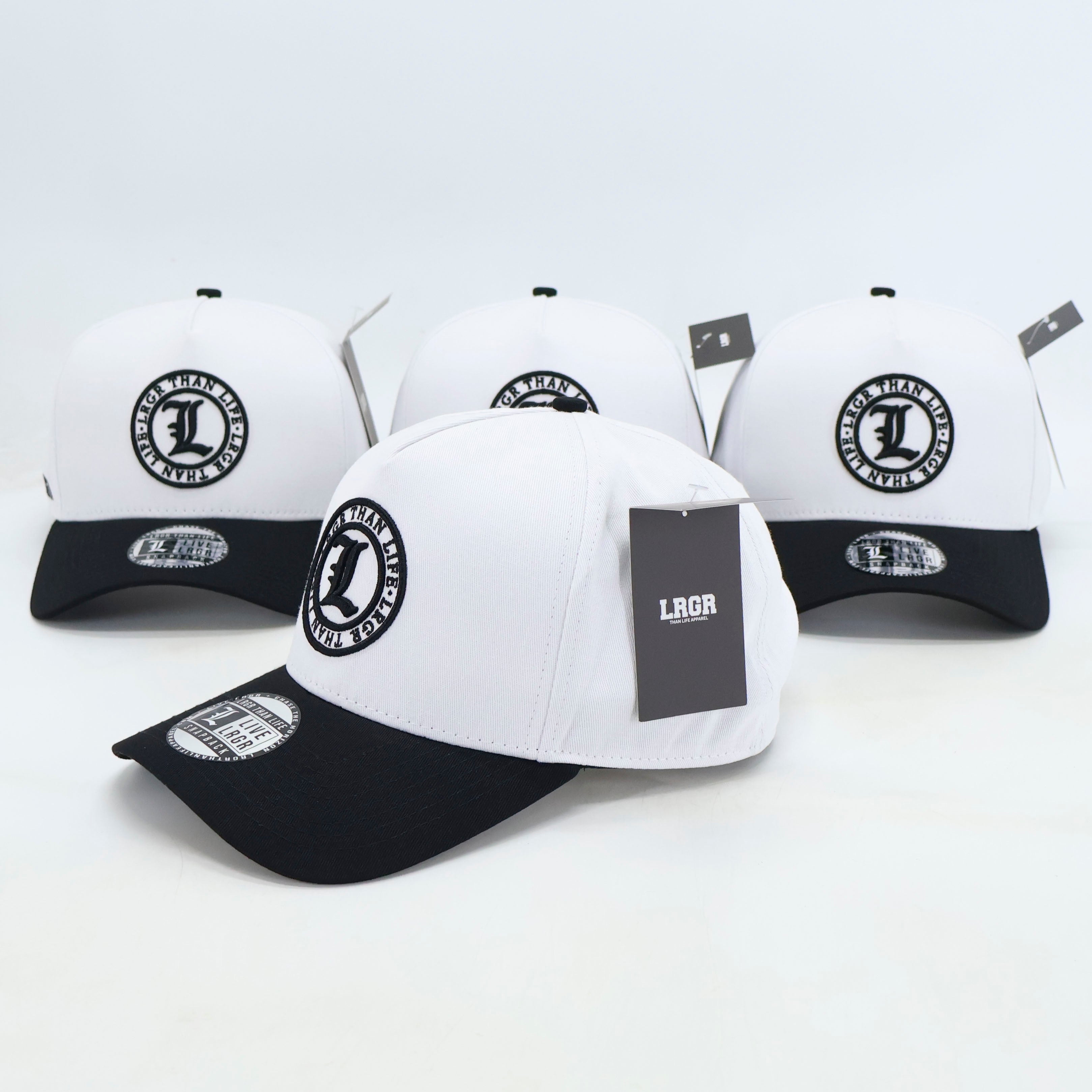 White and black baseball caps with a logo on a white background