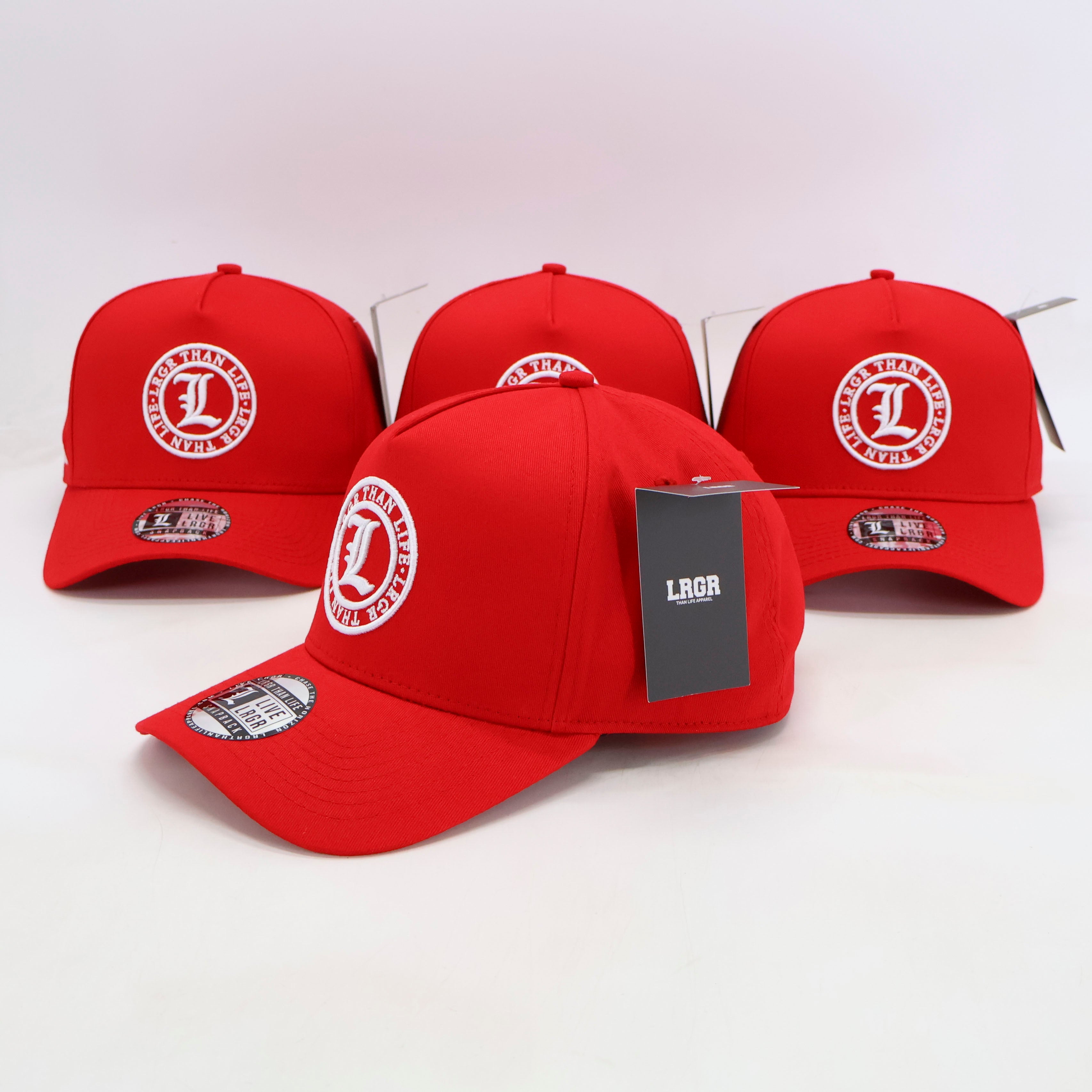 Red baseball caps with a logo on a white background