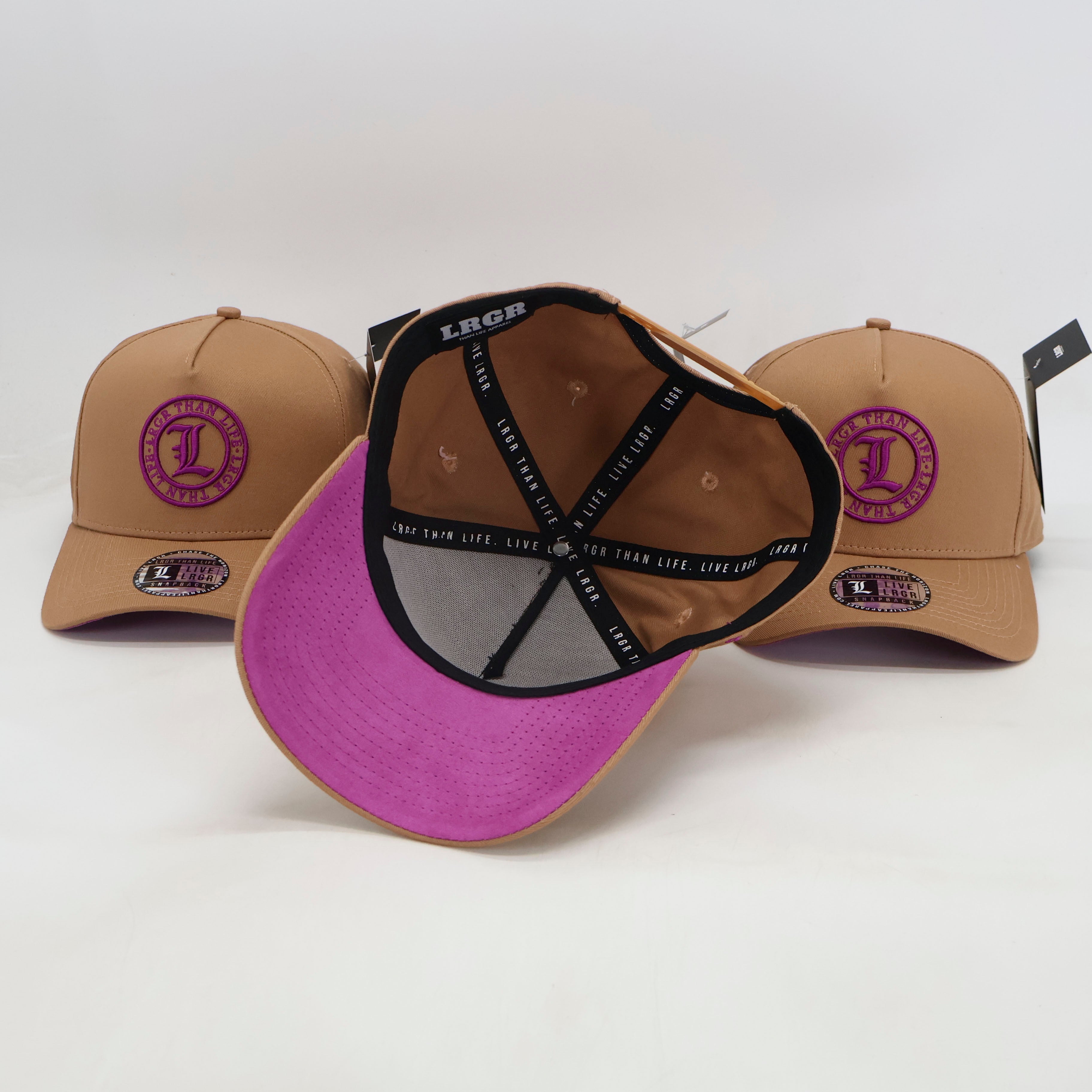 Three caps with different color combinations on a white background