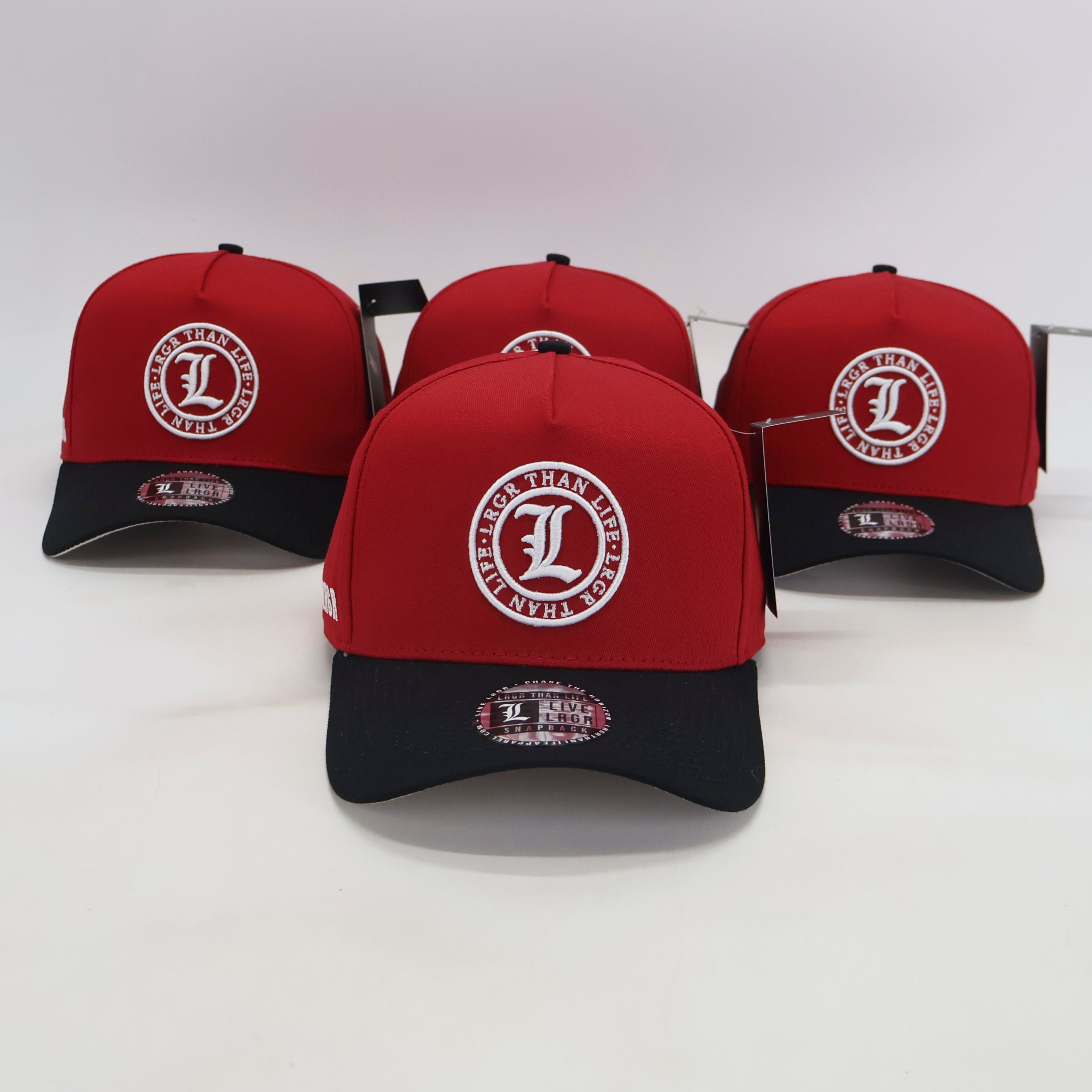 Red and black baseball caps with a logo on a white background