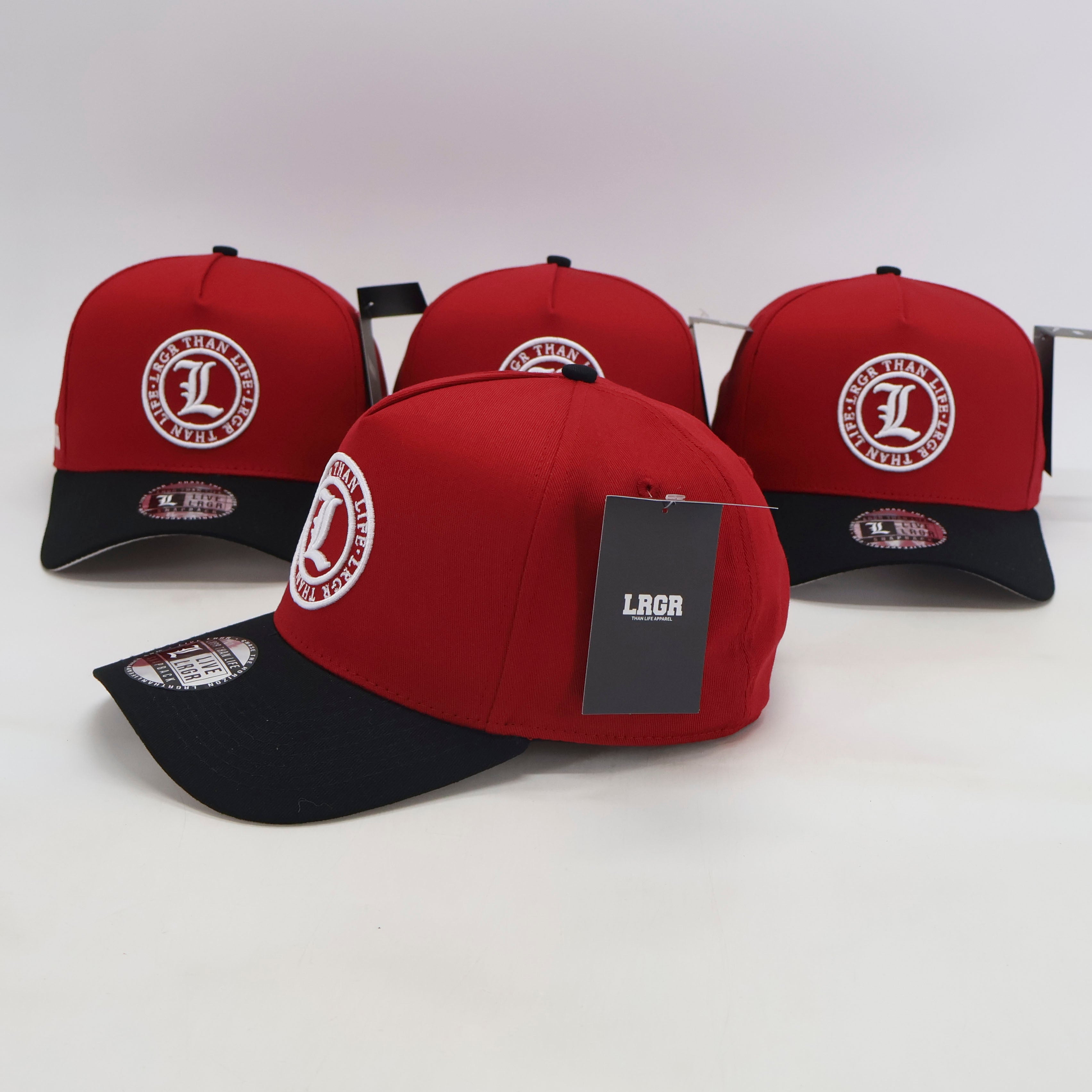 Red and black caps with a visible brand logo on a white background