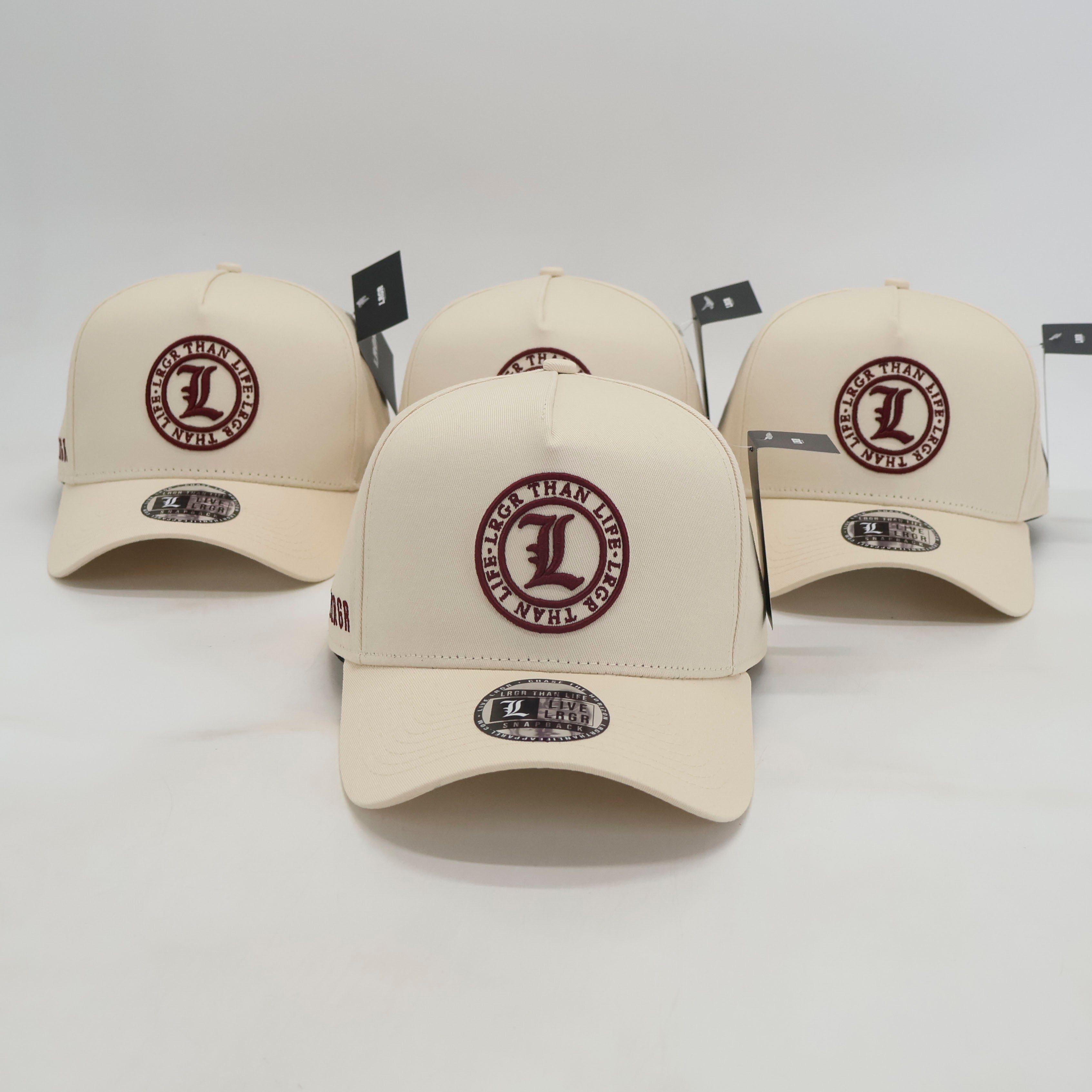 Beige baseball caps with a logo on a white background