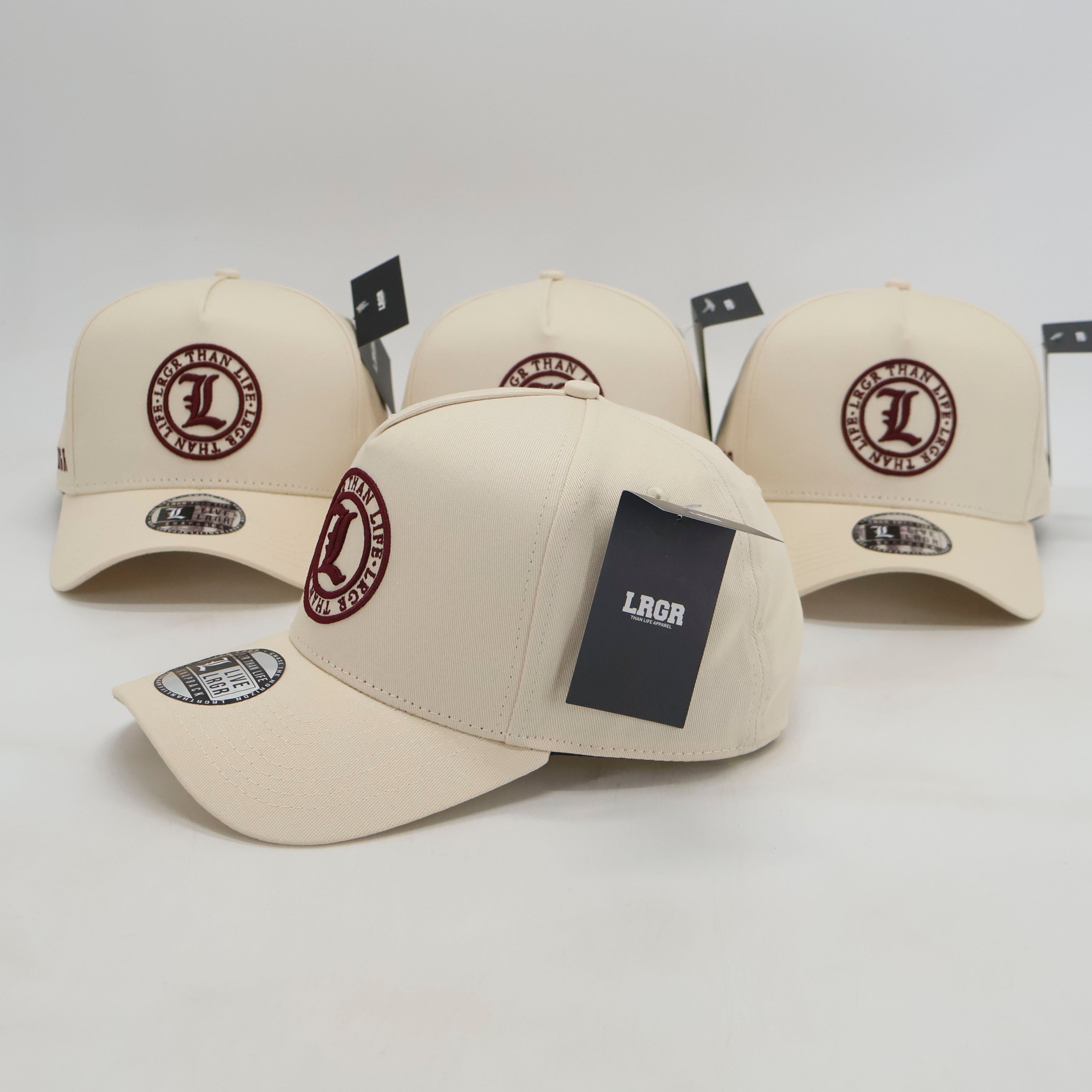 Beige baseball caps with a logo and brand name on a white background