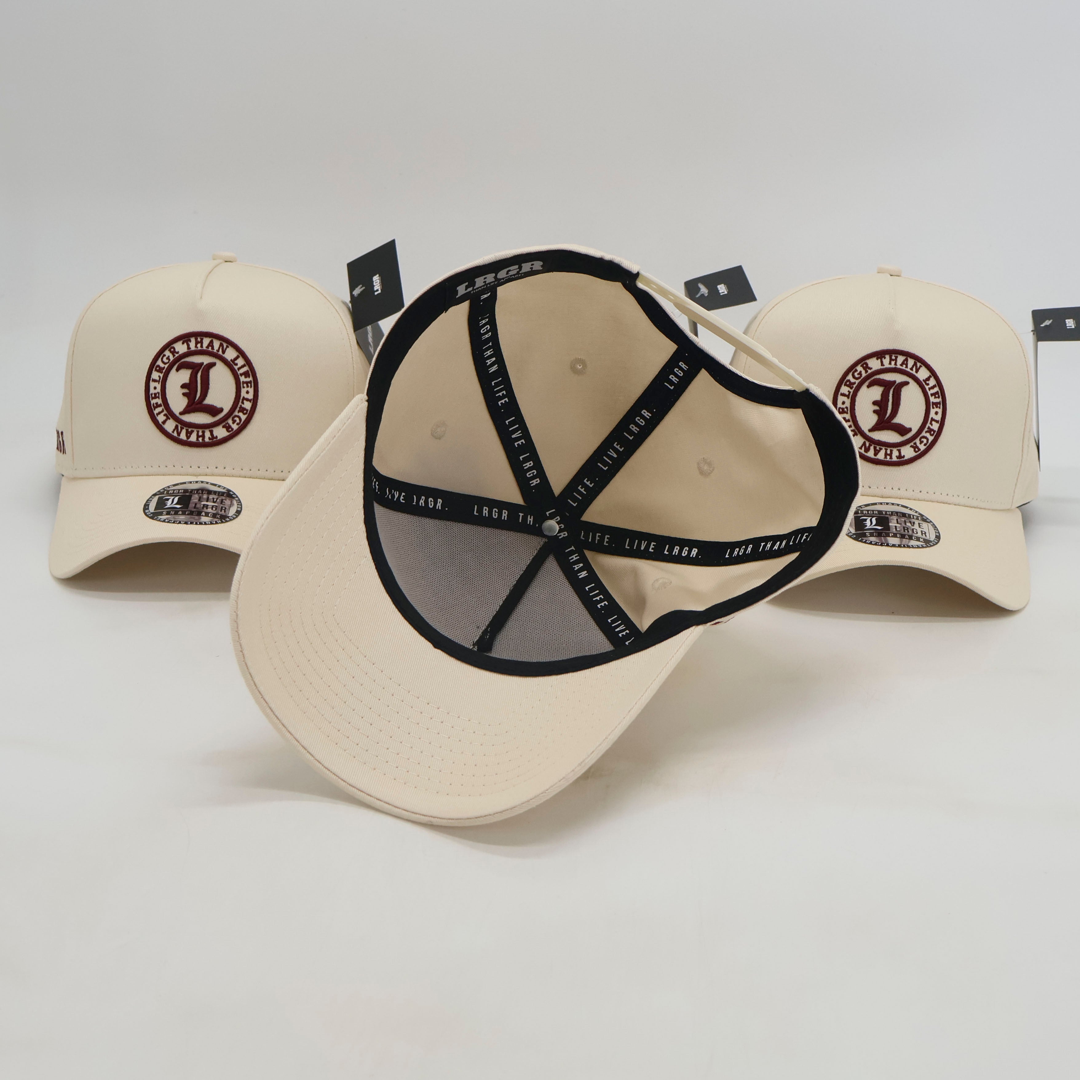 Beige baseball caps with black logos on a white background