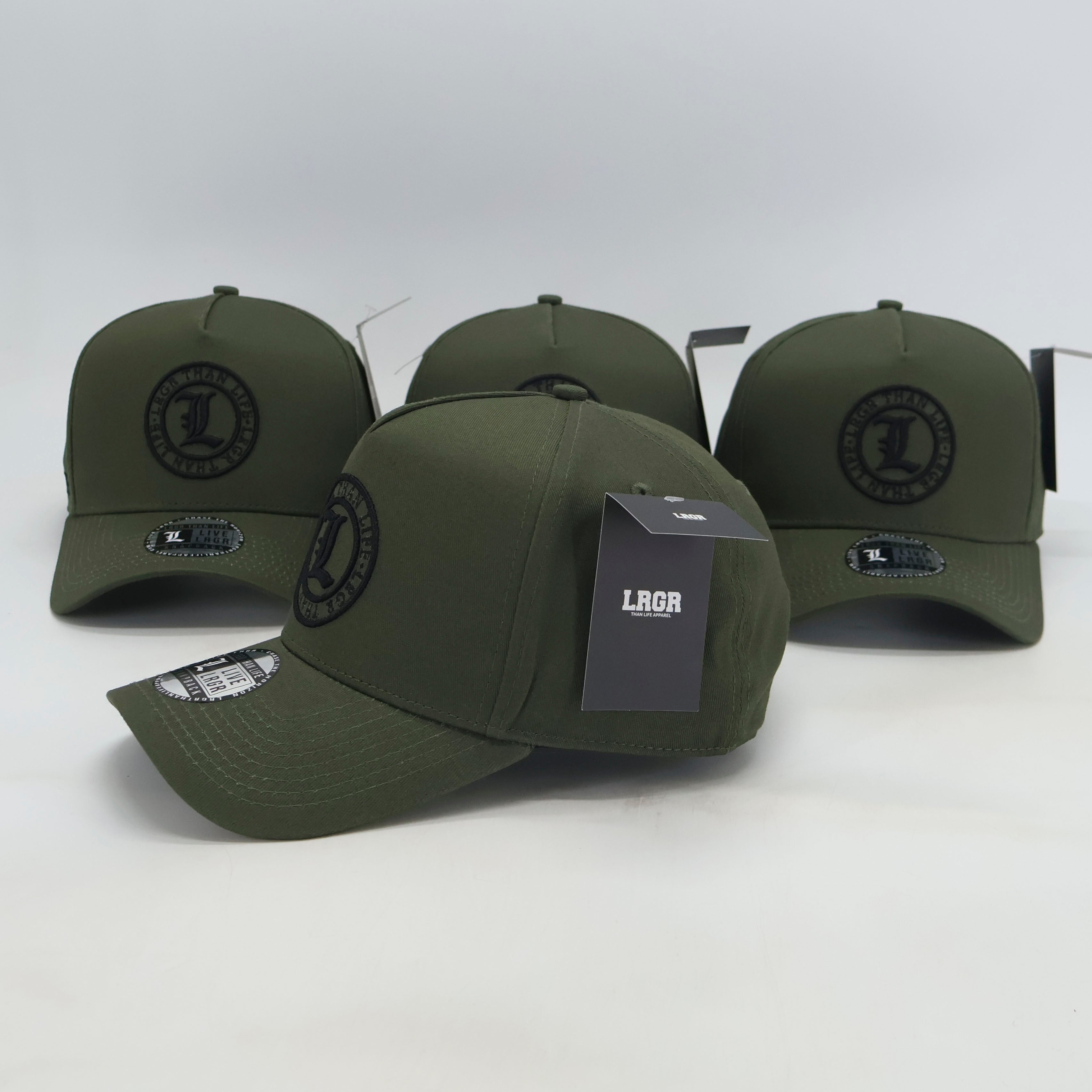 Four green caps with a brand logo on a white background