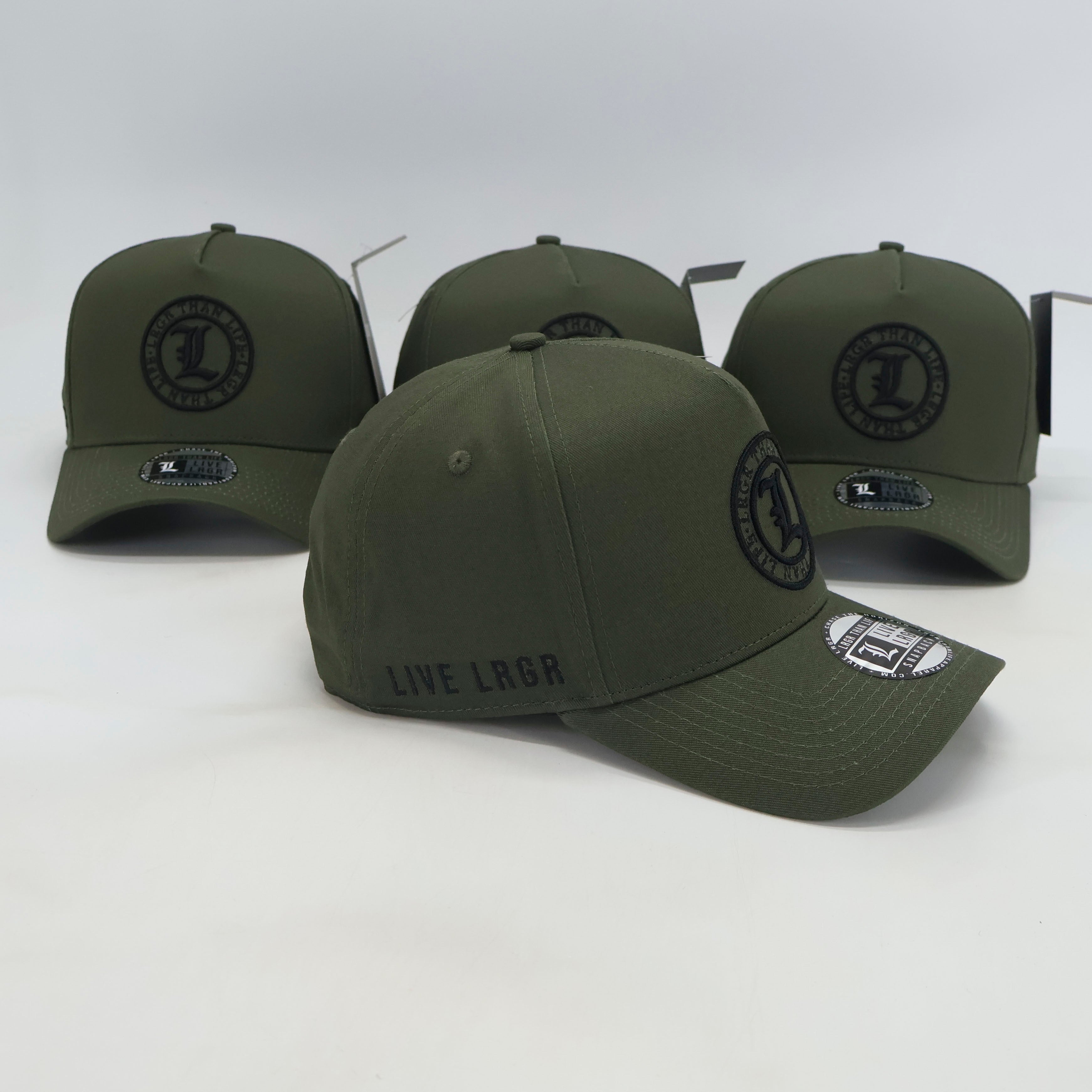 Three green caps with a logo and text on a white background