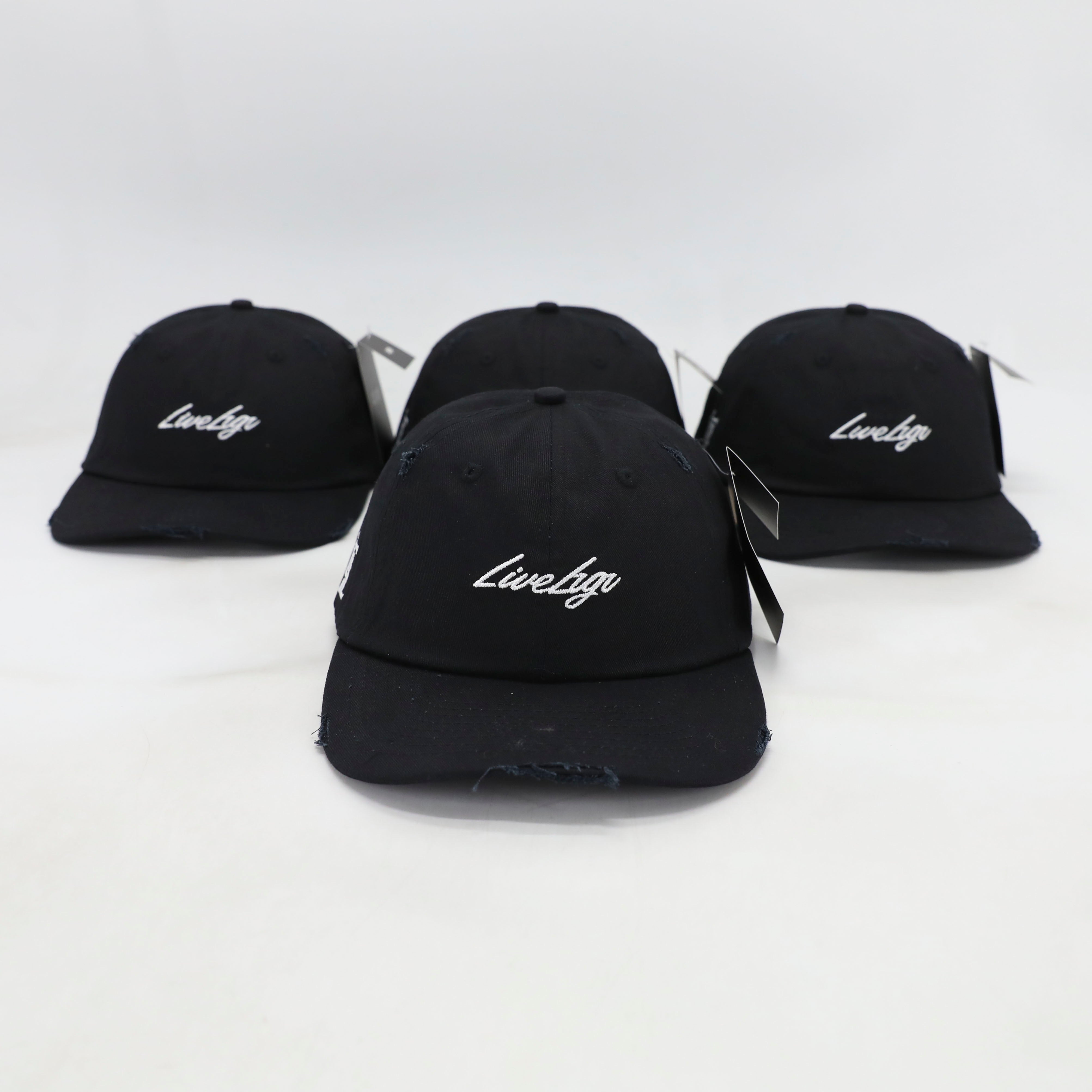 Four black dad hats with the text 'Lovelyst' written in white on the front, displayed against a white background.