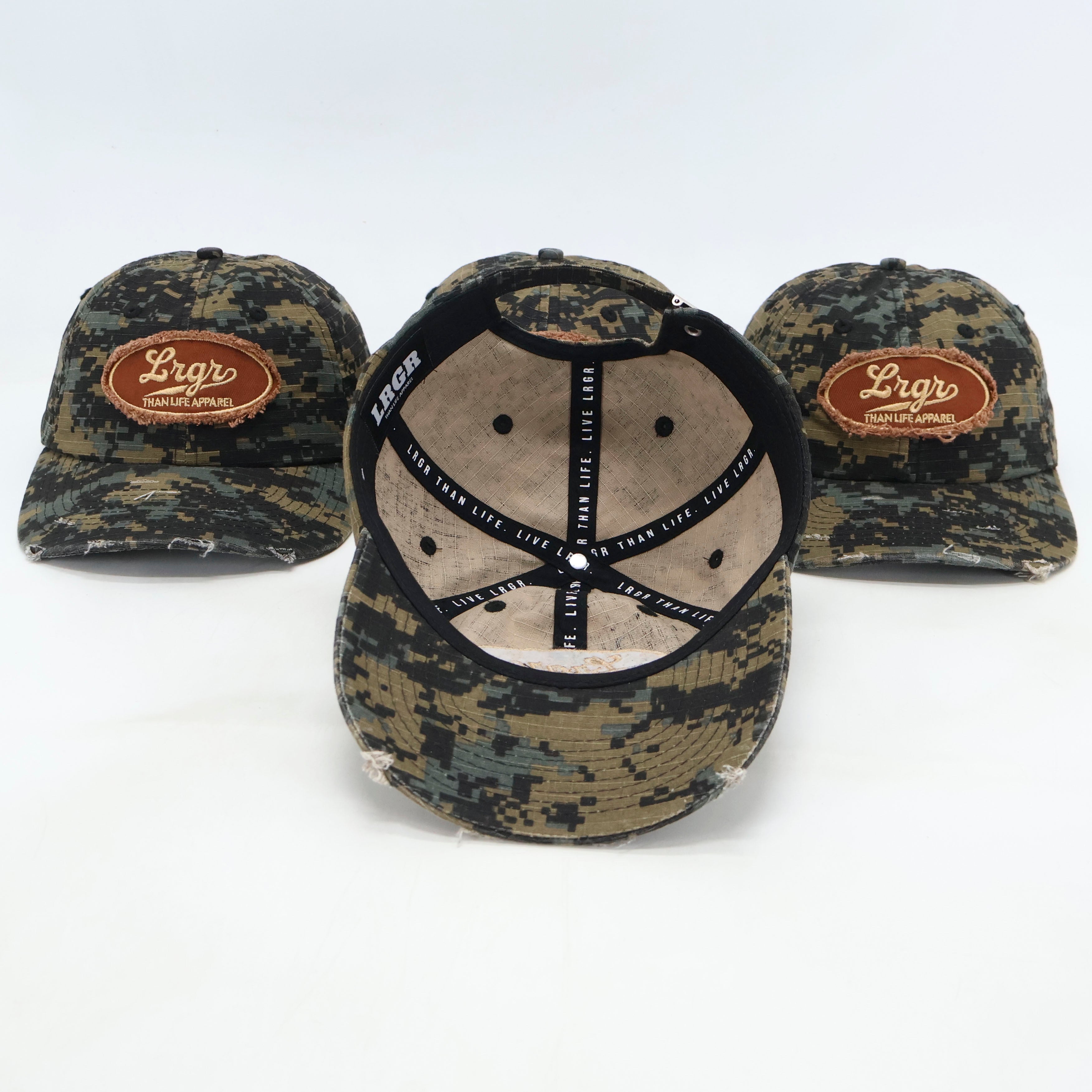 Three camouflaged baseball caps with a 'LGRG' logo on the front.