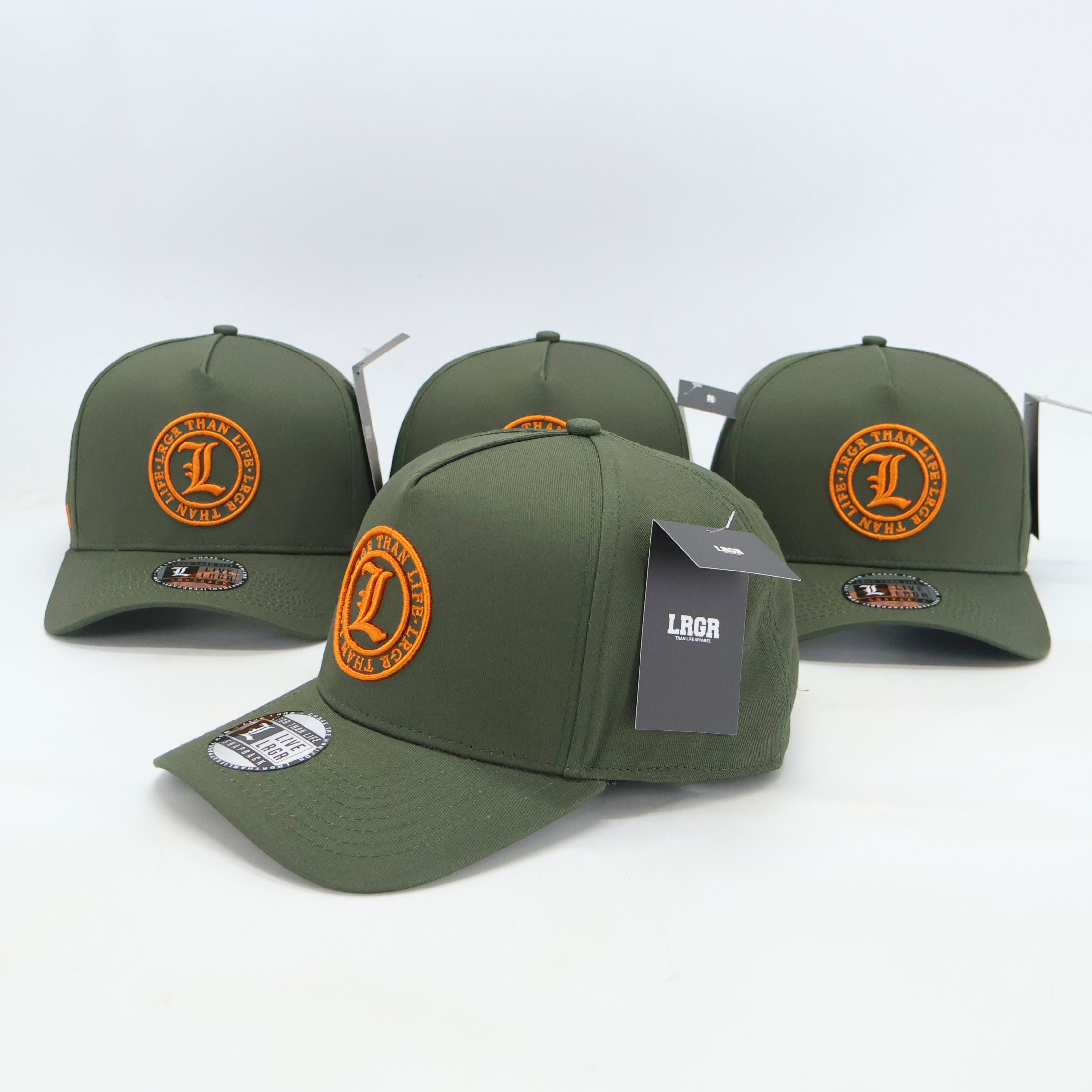 Three green baseball caps with orange logos on a white background