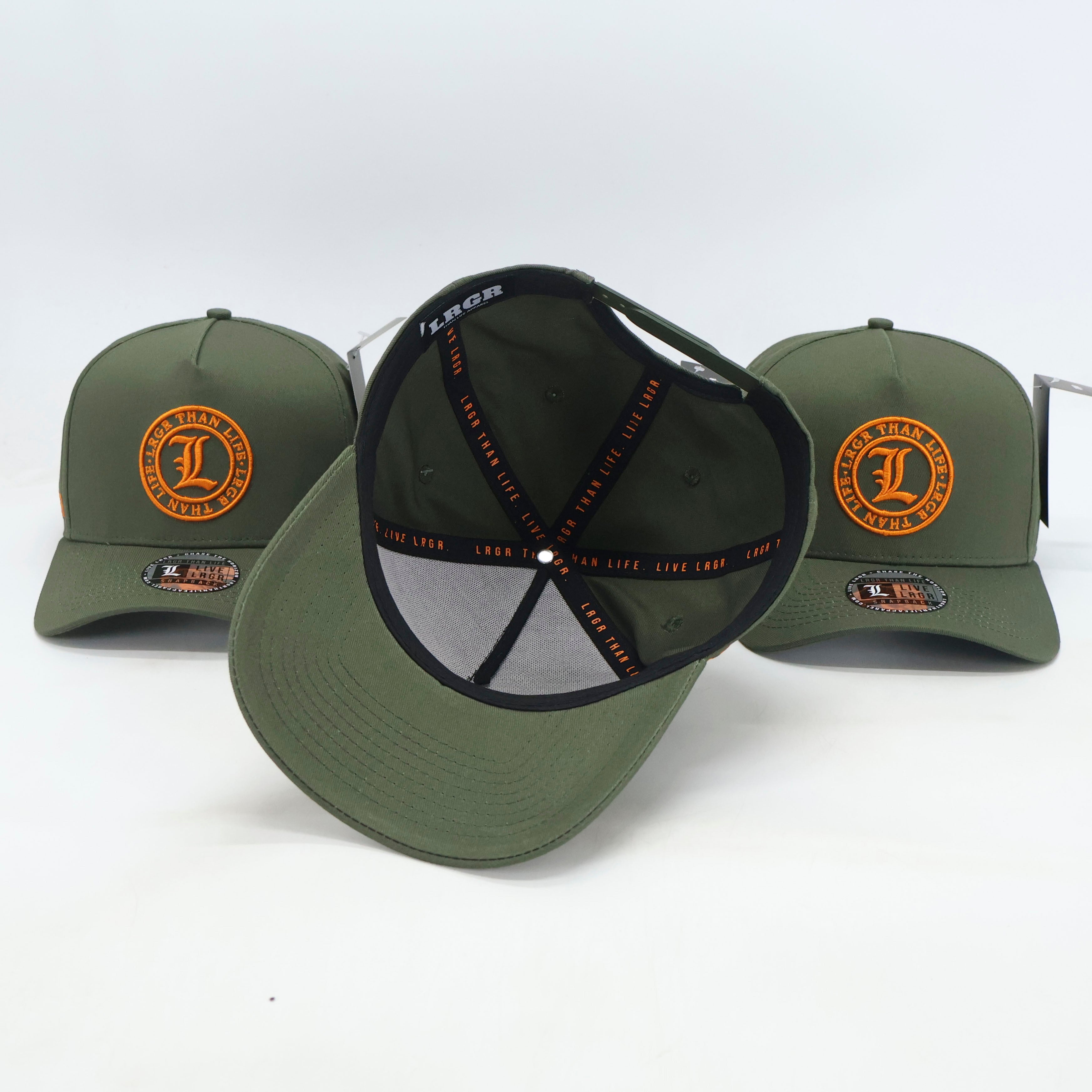 Three green baseball caps with orange logos on a white background
