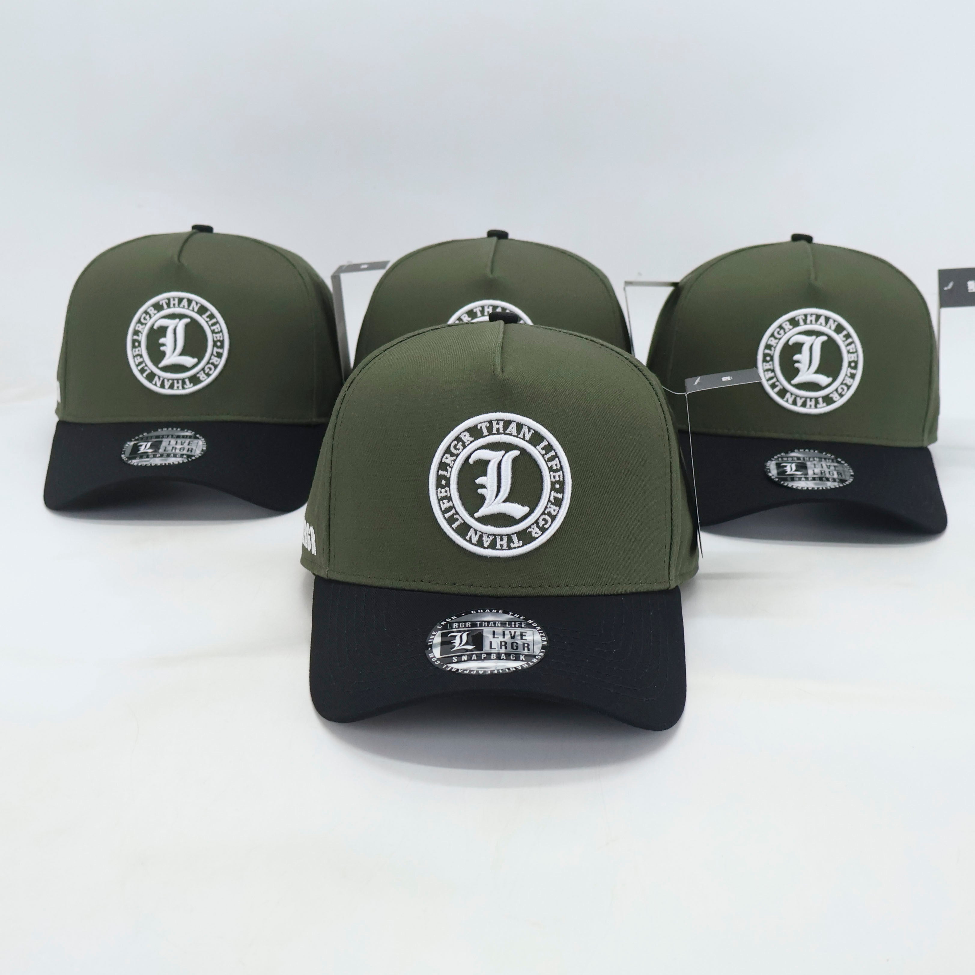 Four green and black LRGR baseball caps with a logo on a white background