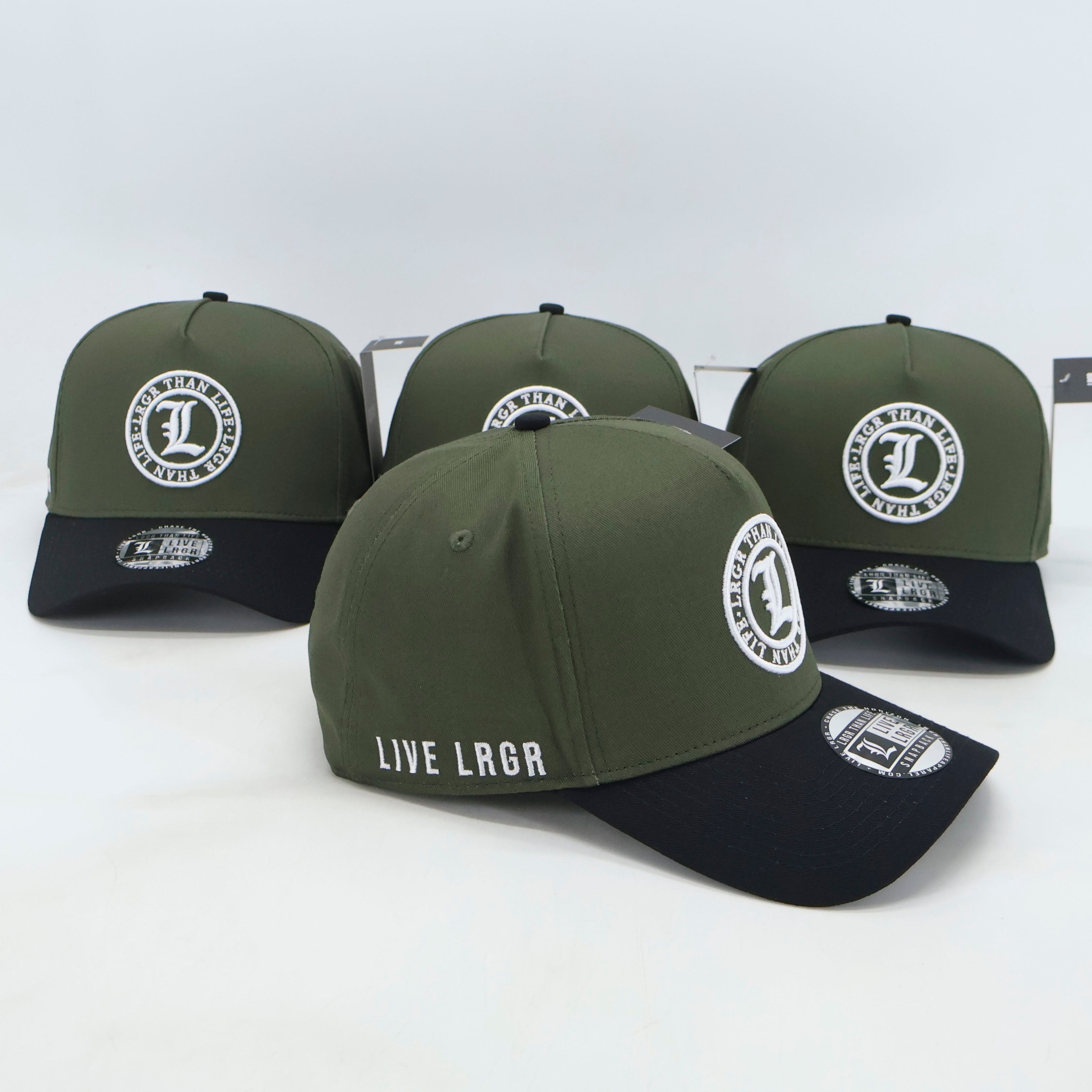 Four green and black caps with a logo and 'LIVE LRGR' text on a white background