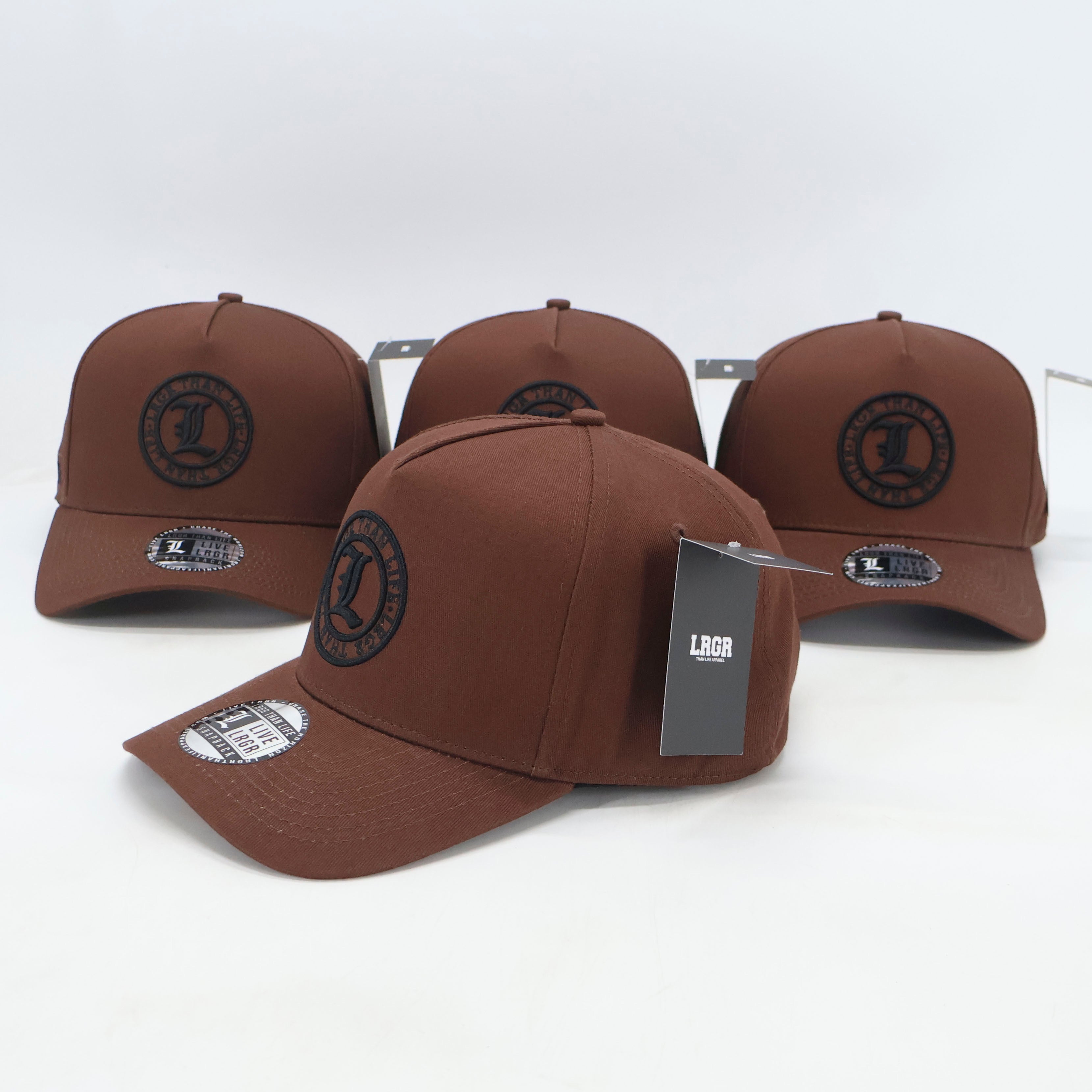 Brown baseball caps with a logo on a white background