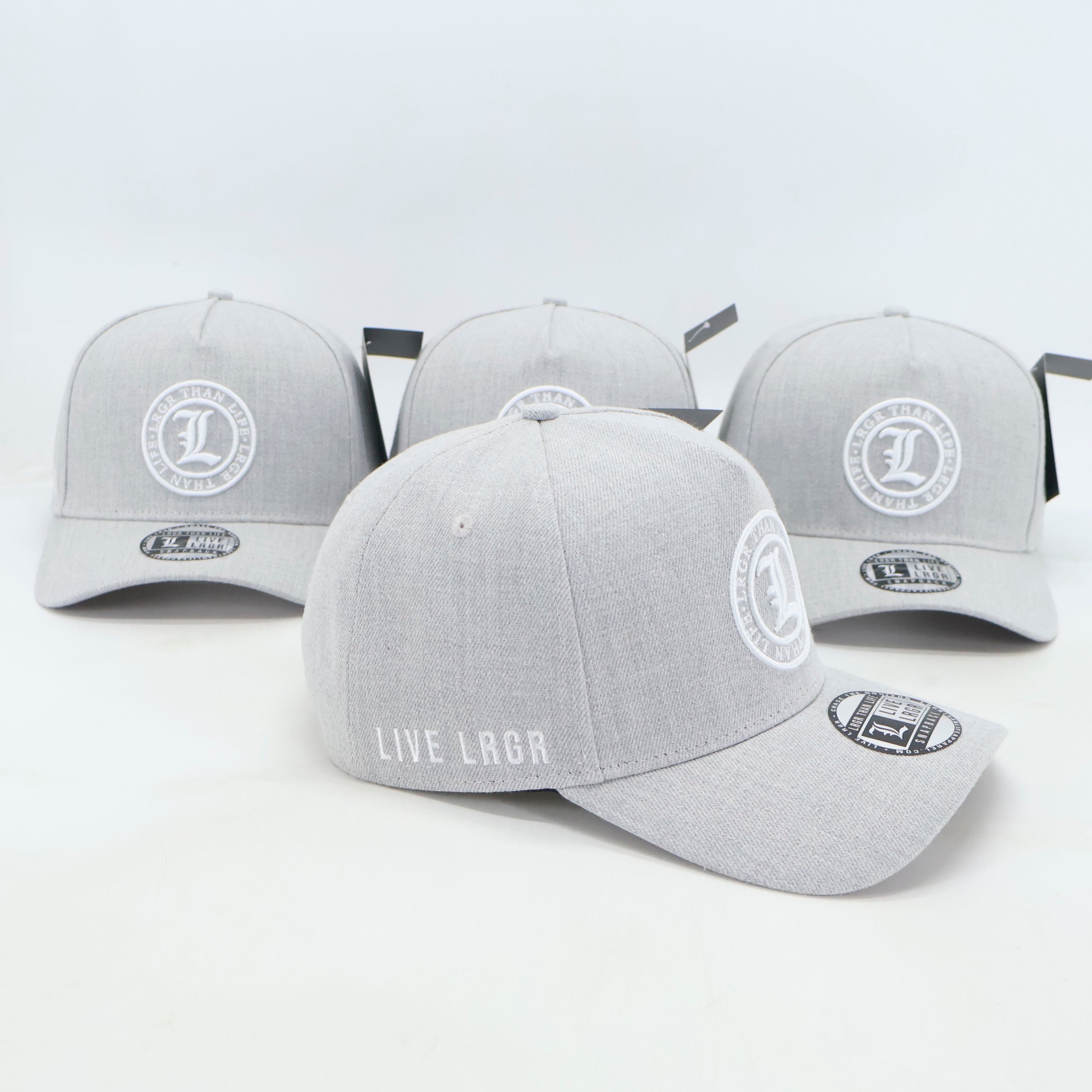 Gray baseball caps with branding on a light gray background