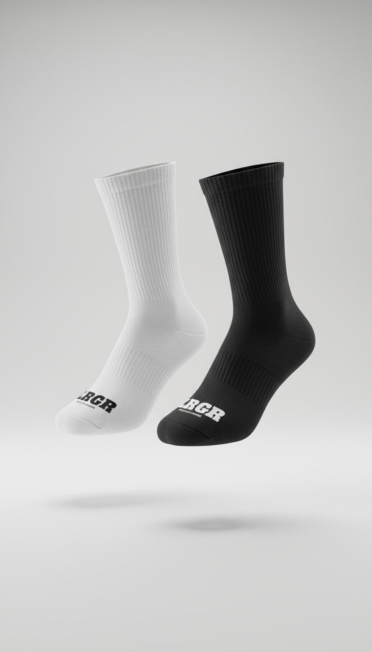 Two socks, one white and one black, with a brand logo on a light gray background.